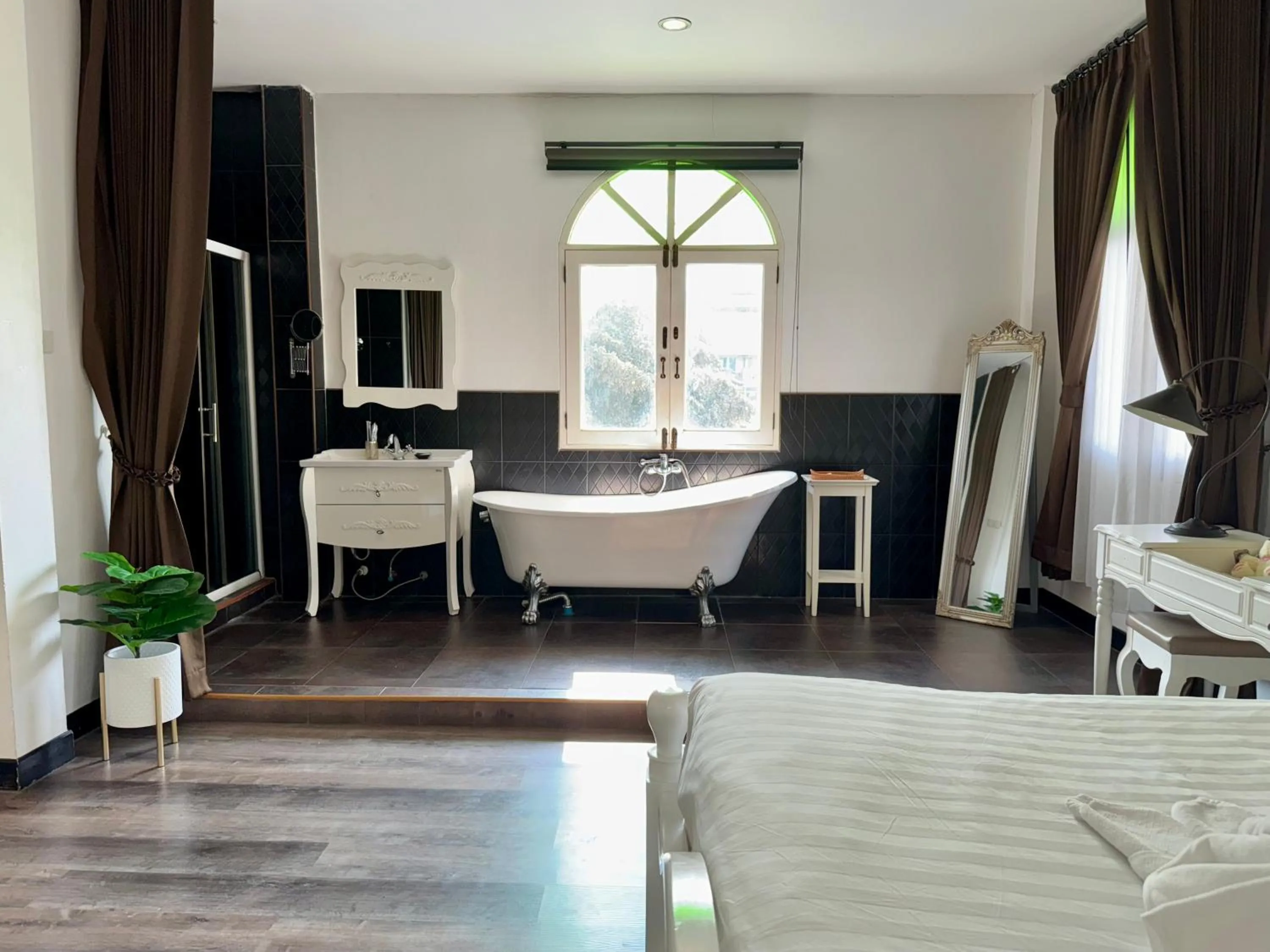 Bed in Nidhra Lanna Hotel Chiang Mai