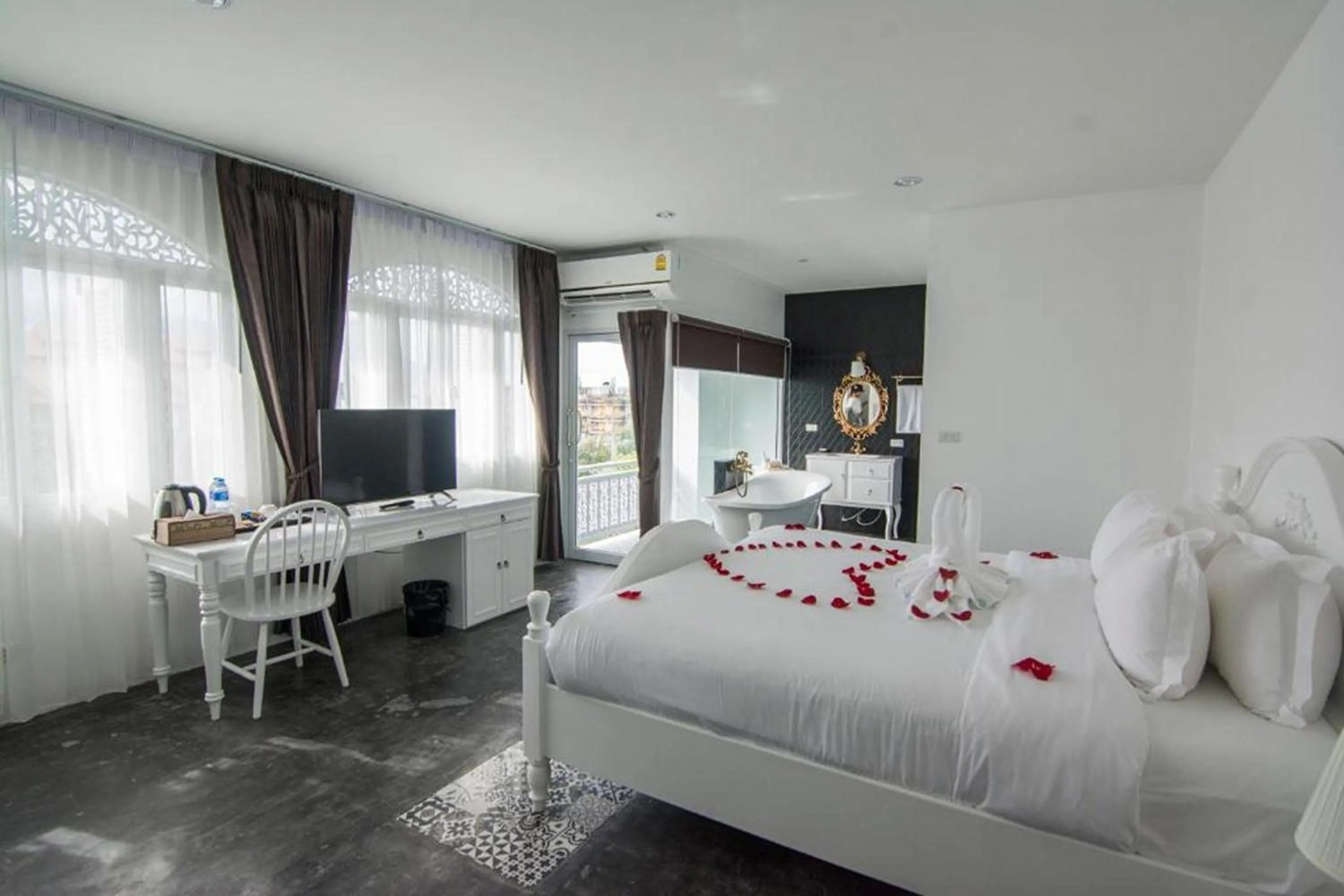 Photo of the whole room, Bed in Nidhra Lanna Hotel Chiang Mai