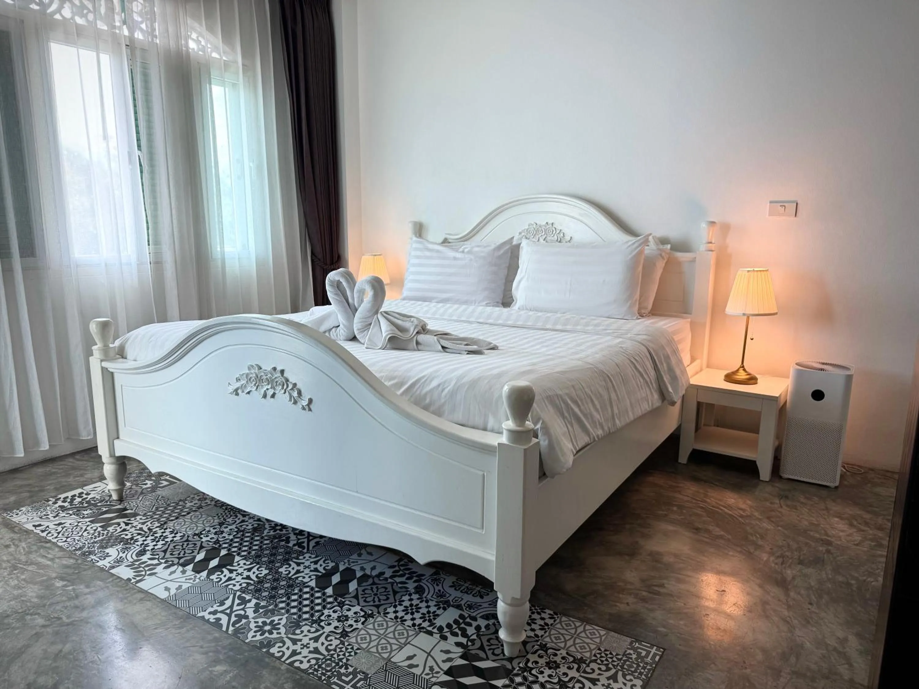 Bed in Nidhra Lanna Hotel Chiang Mai