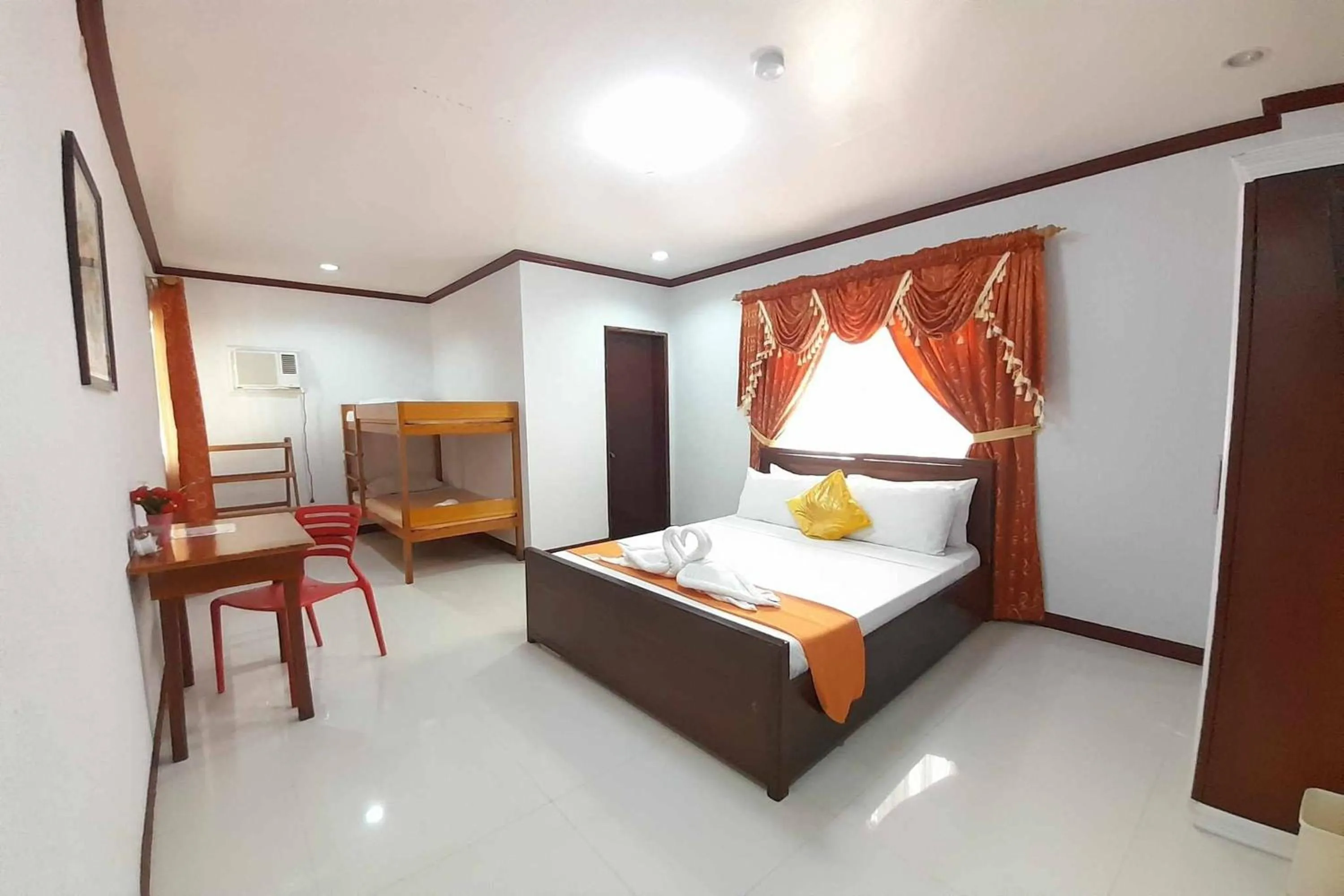 Photo of the whole room, Bed in Gilin Suites Puerto Princesa Palawan
