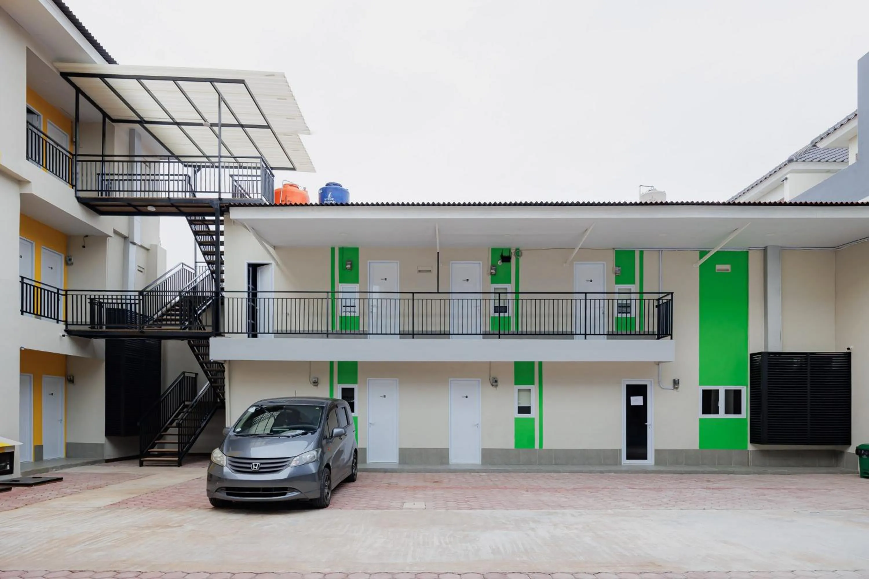 Facade/entrance in Urbanview Petukangan Mansion Jakarta