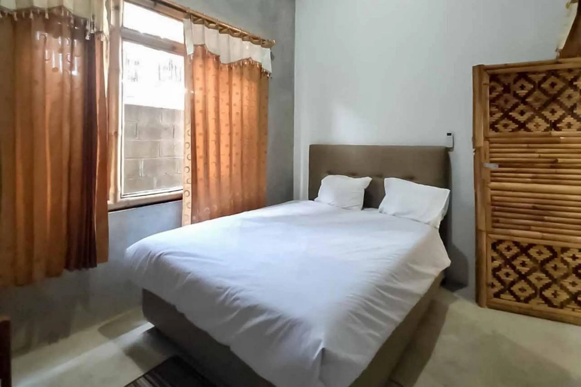 Sukawana Guest House Mitra RedDoorz