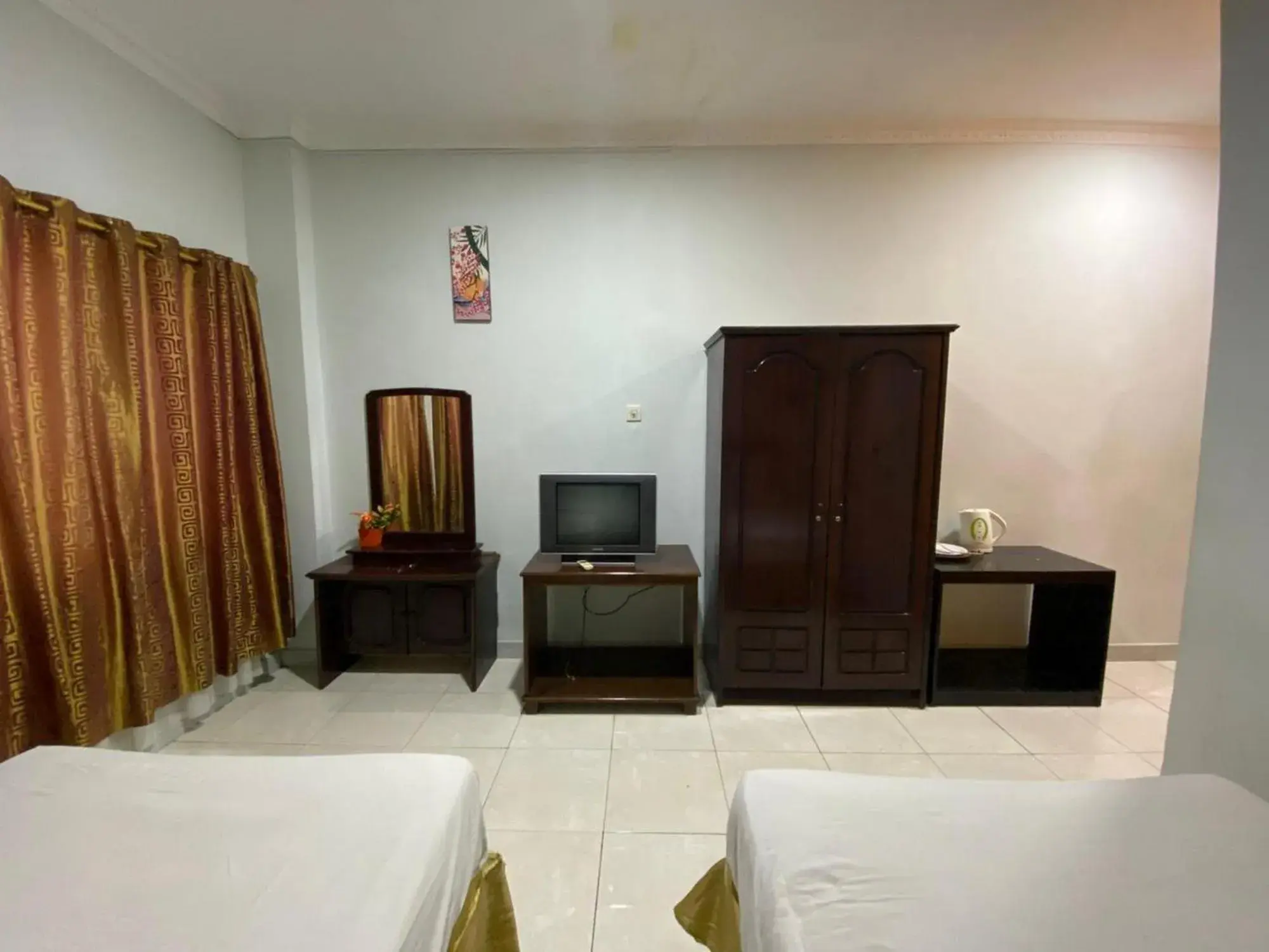 Bed in Hotel Magellona Makassar Mitra RedDoorz Bed in Hotel Magellona Makassar Mitra RedDoorz