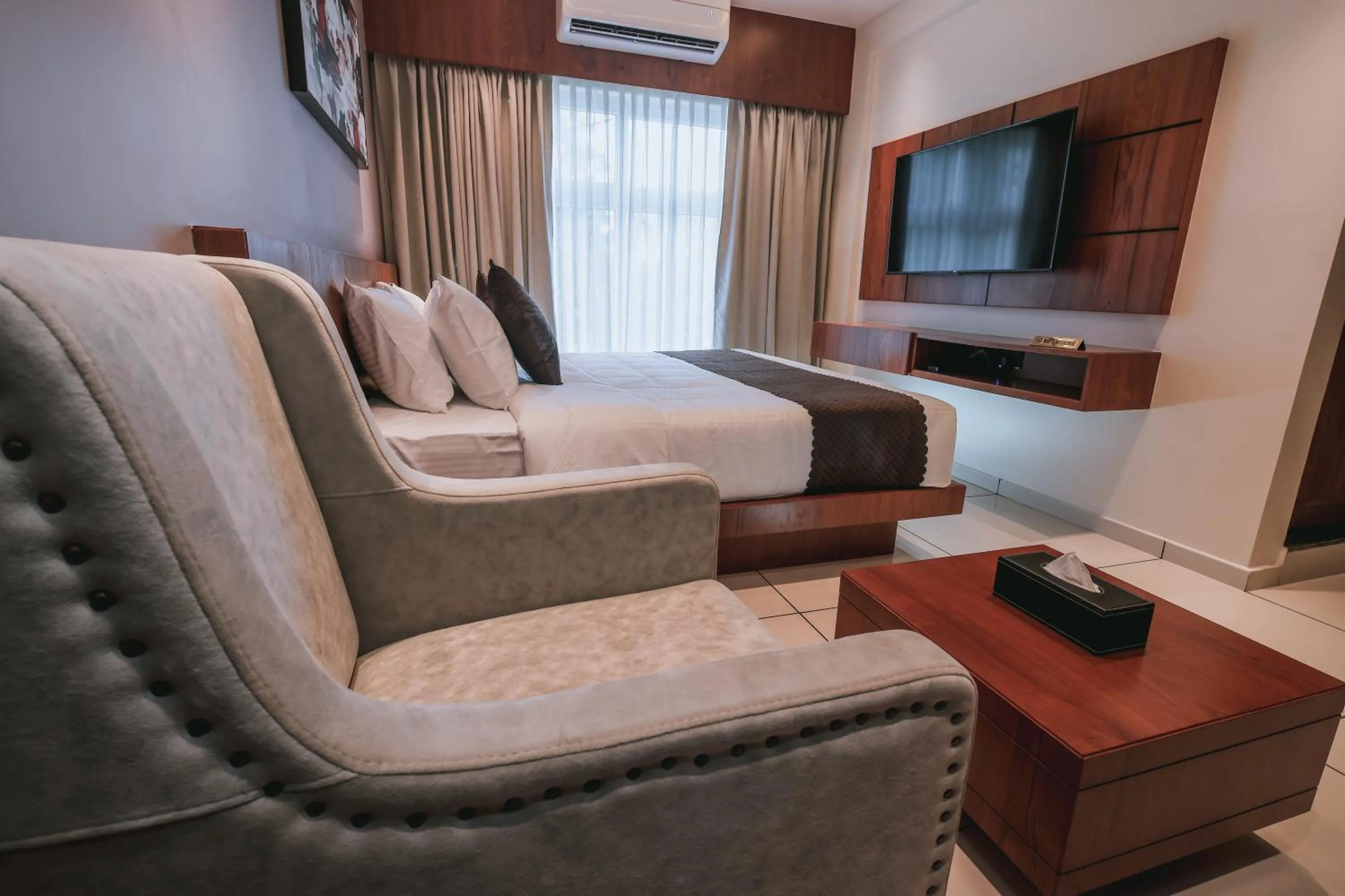 Bedroom in Fortview Suites