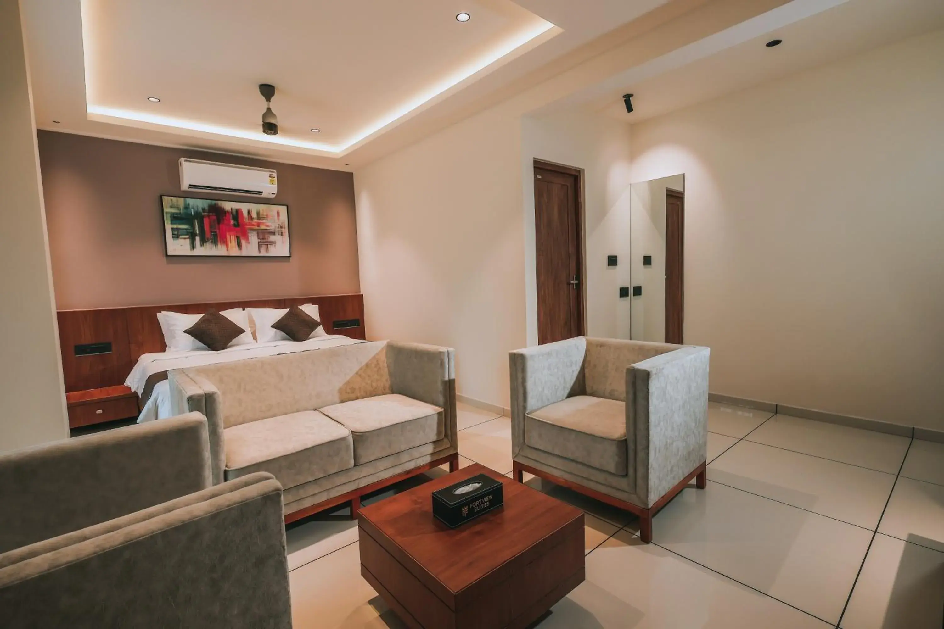 Seating area, Bed in Fortview Suites Seating area, Bed in Fortview Suites