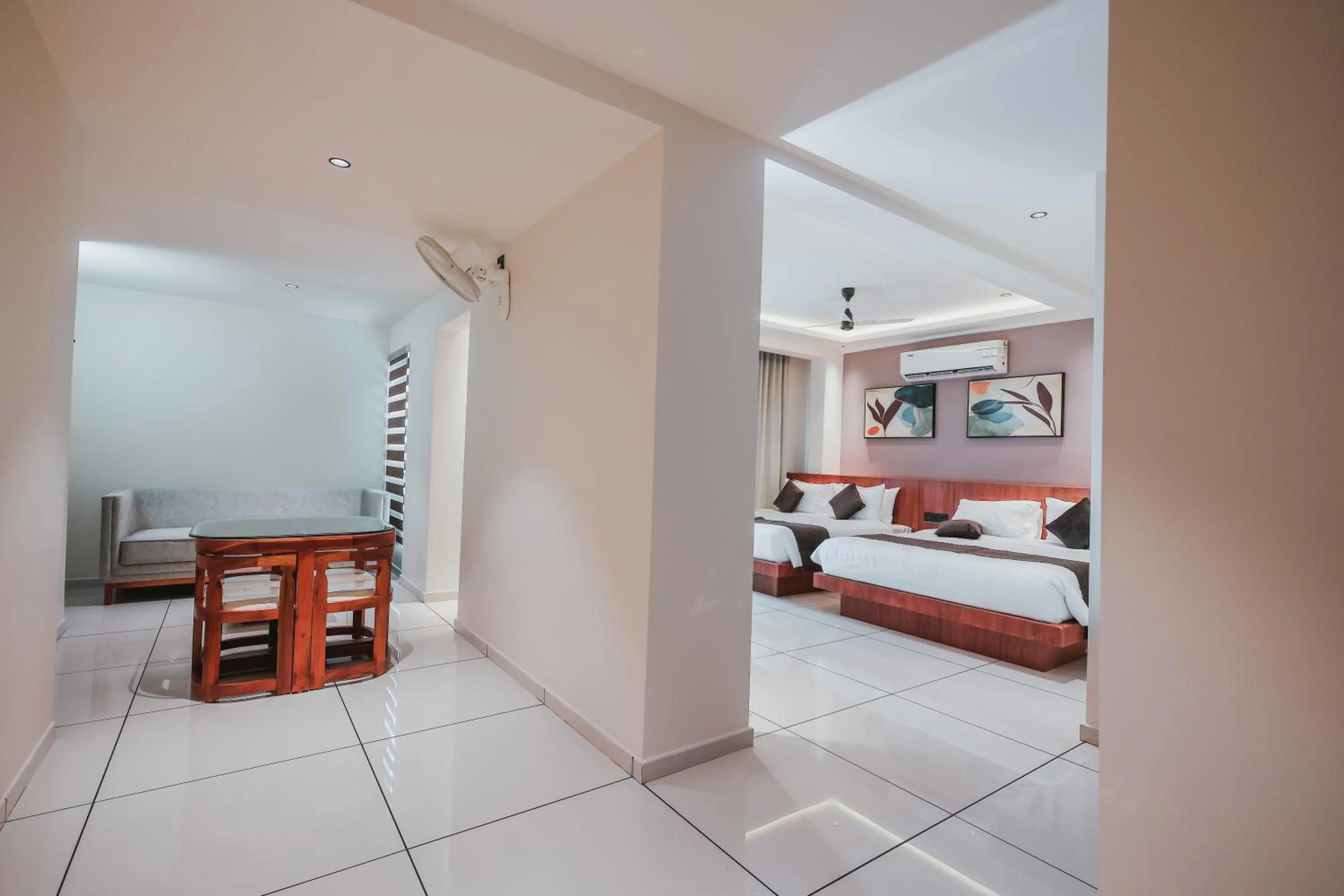 Living room, Bed in Fortview Suites