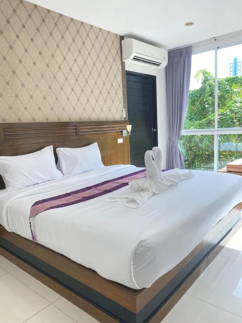 Bed in NJ PATONG HOTEL