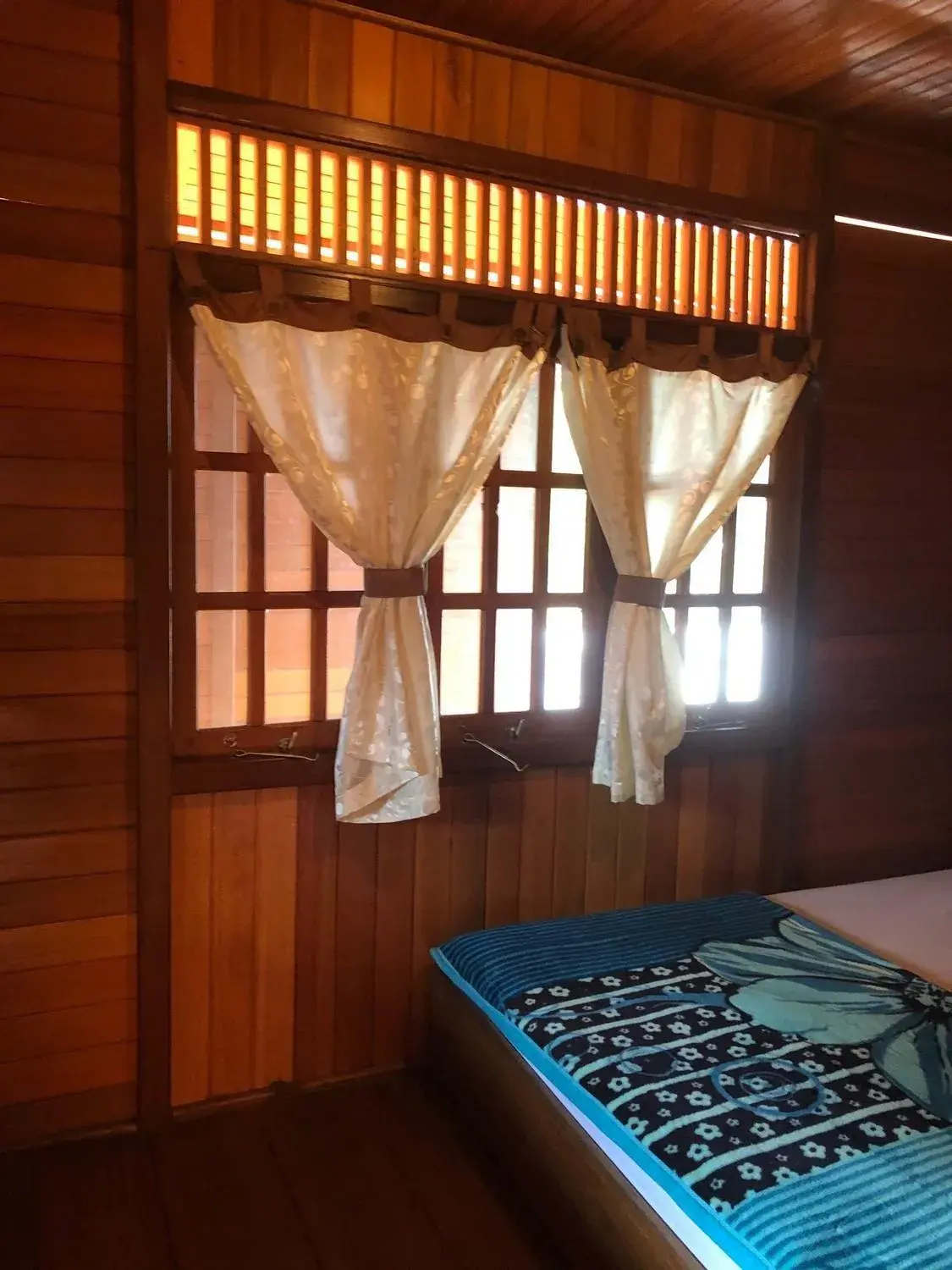 Bed in Roemah Kayu Saragan Syariah Magelang Mitra RedDoorz Bed in Roemah Kayu Saragan Syariah Magelang Mitra RedDoorz