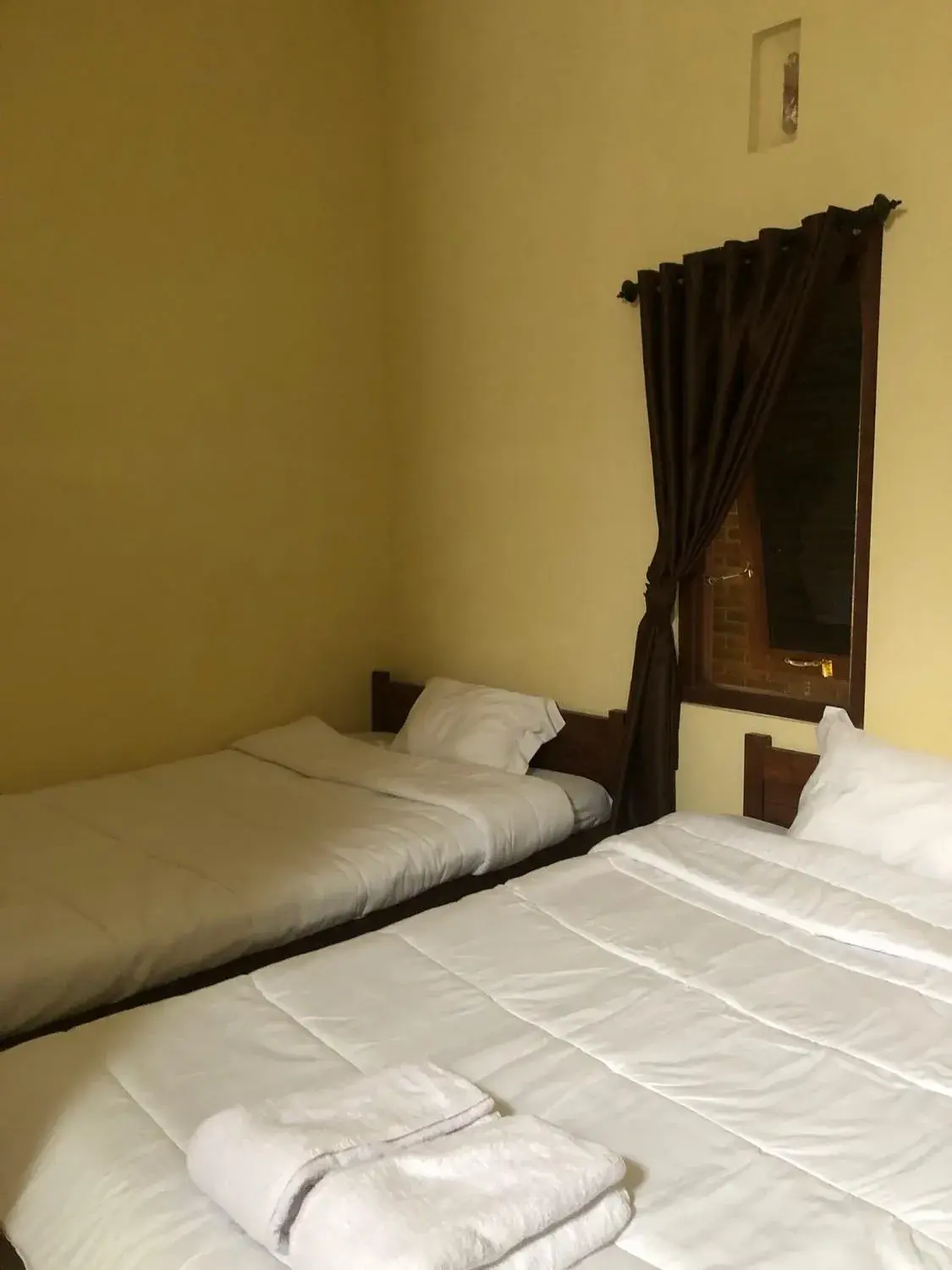 Twin Room - single occupancy in Homestay Mulia Syariah Borobudur Magelang Mitra RedDoorz Twin Room - single occupancy in Homestay Mulia Syariah Borobudur Magelang Mitra RedDoorz