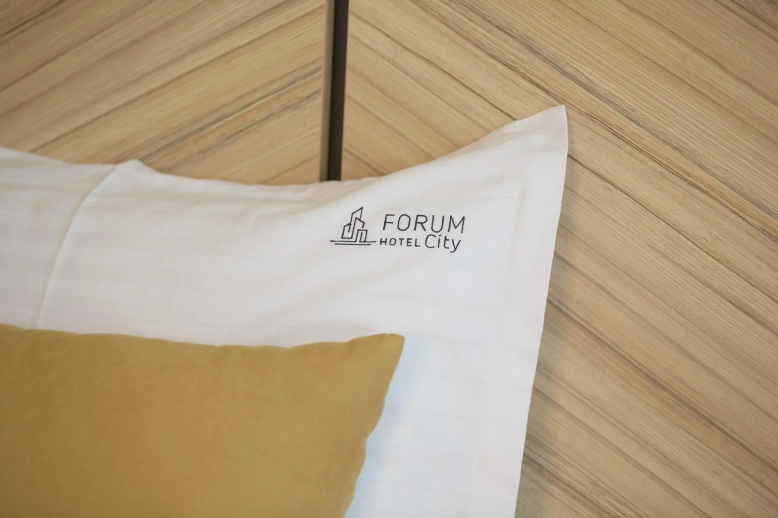 Bed in Hotel Forum City