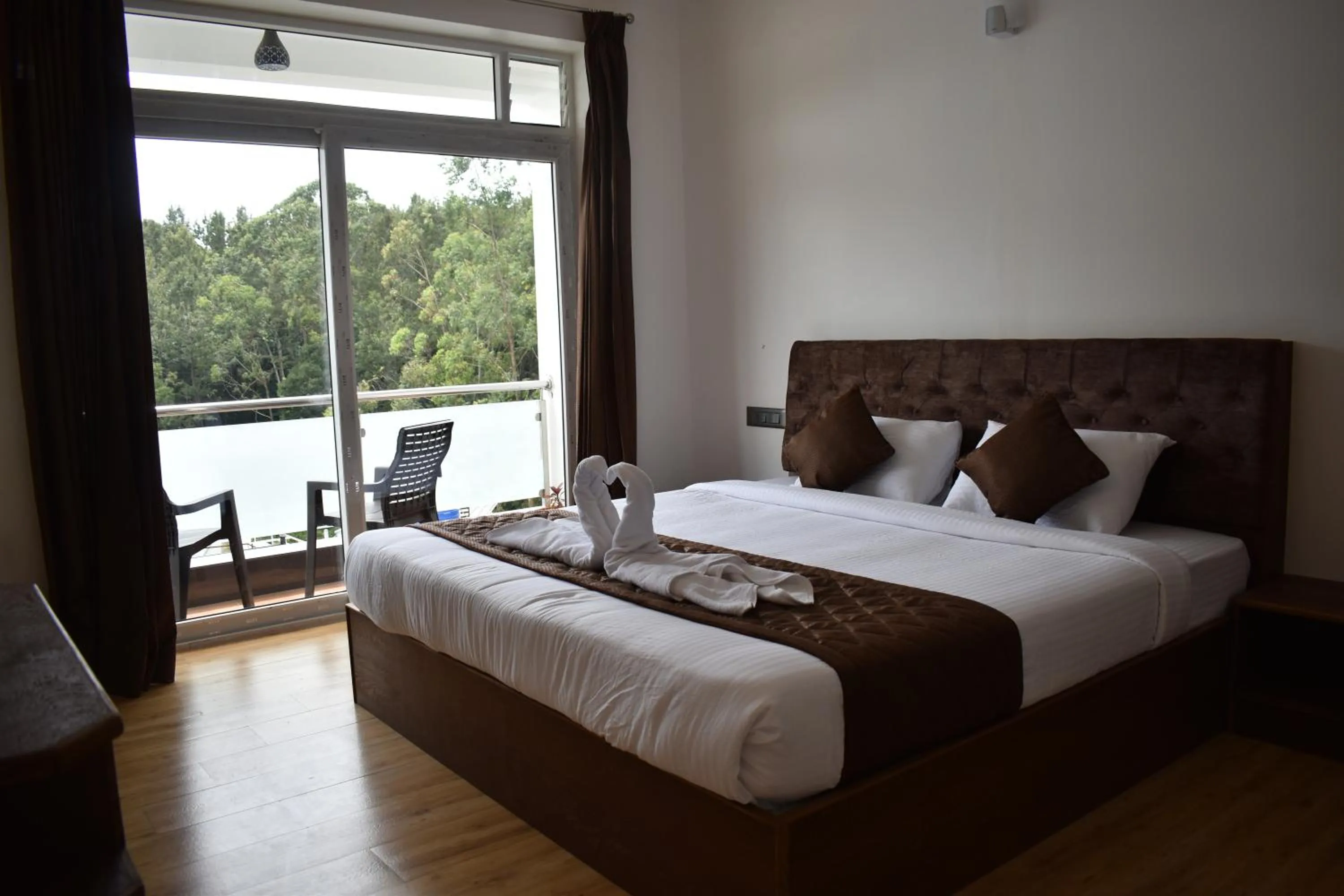 Bed in Hotel NT Grand Yercaud