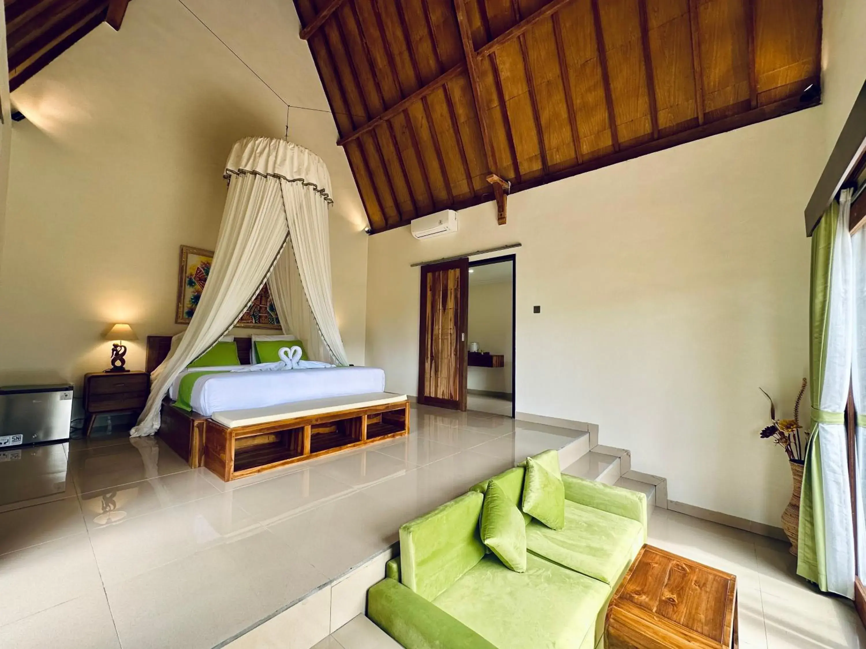 Photo of the whole room, Bed in Green Coco Suite Photo of the whole room, Bed in Green Coco Suite