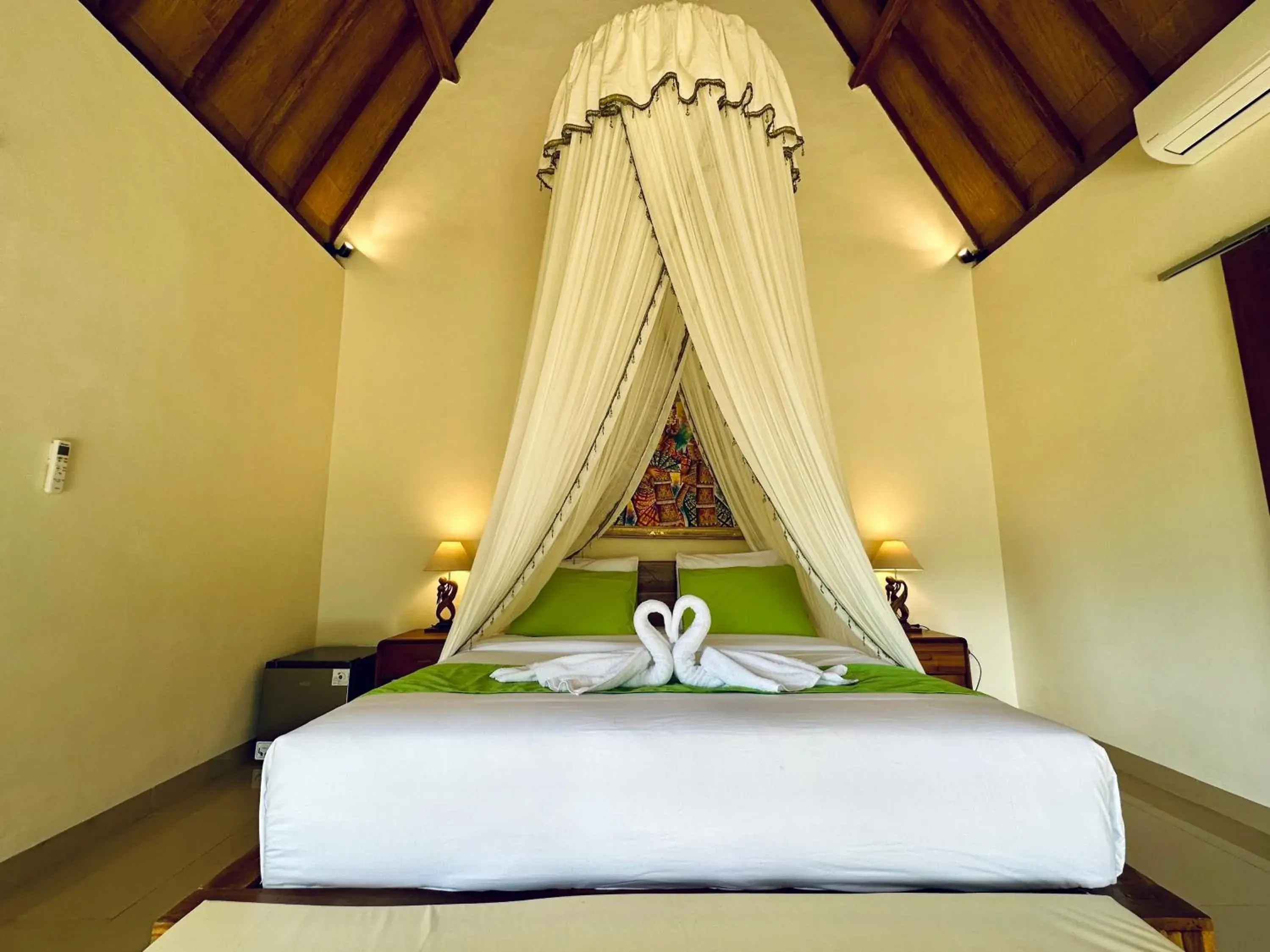 Bed in Green Coco Suite Bed in Green Coco Suite