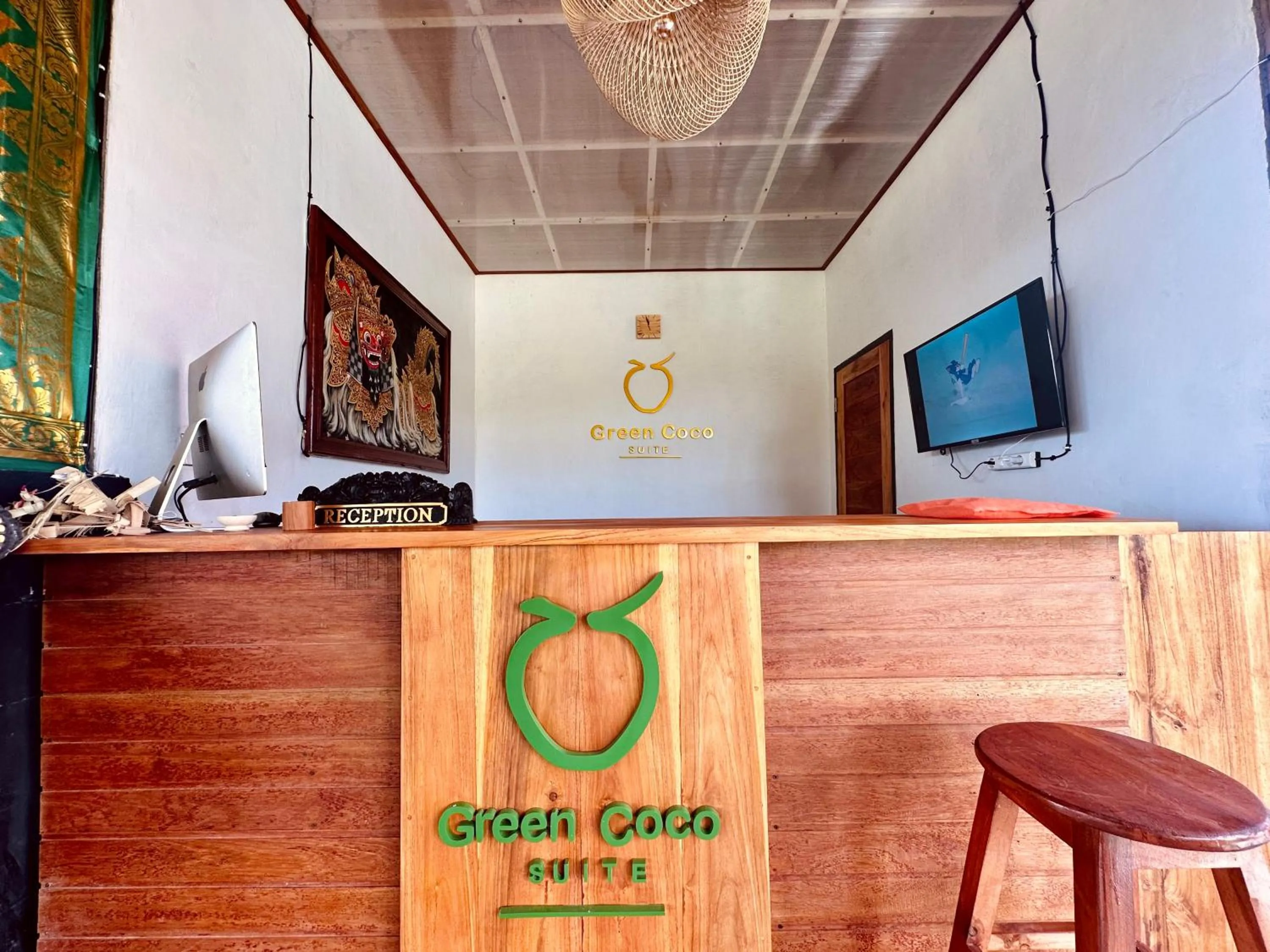 Property logo or sign in Green Coco Suite