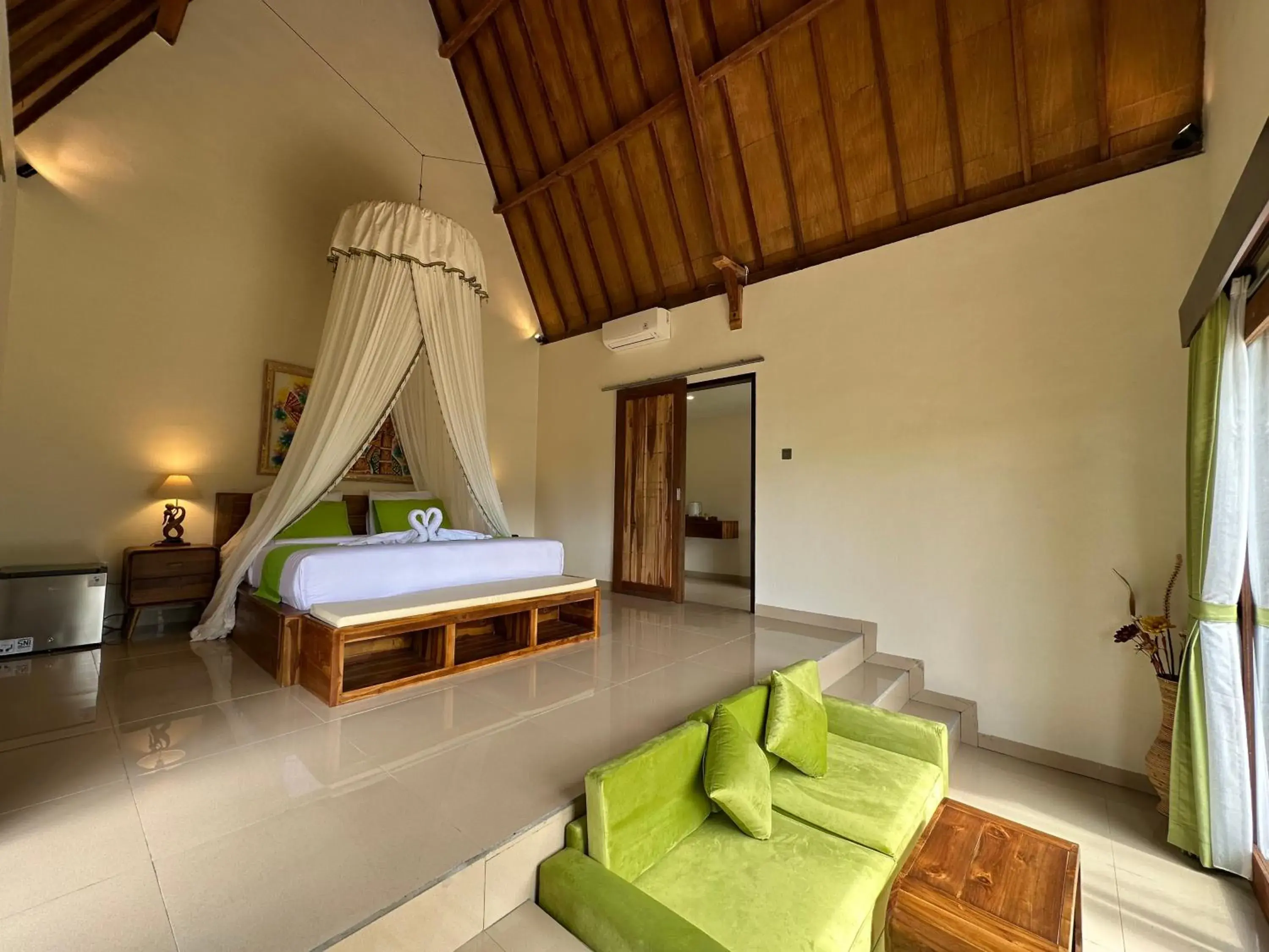 Bed in Green Coco Suite Bed in Green Coco Suite