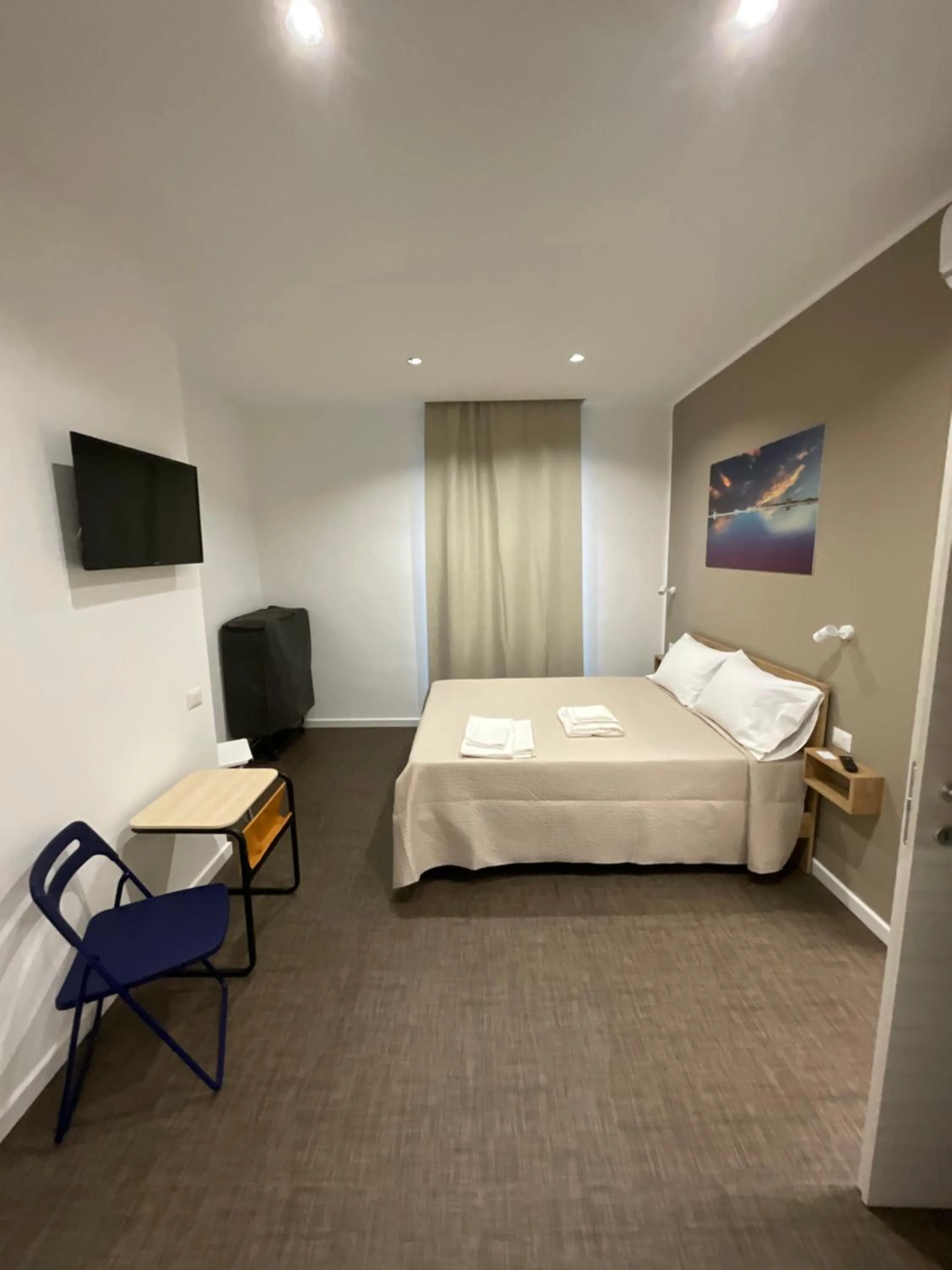 Bed in M&M rooms Margherita di Savoia