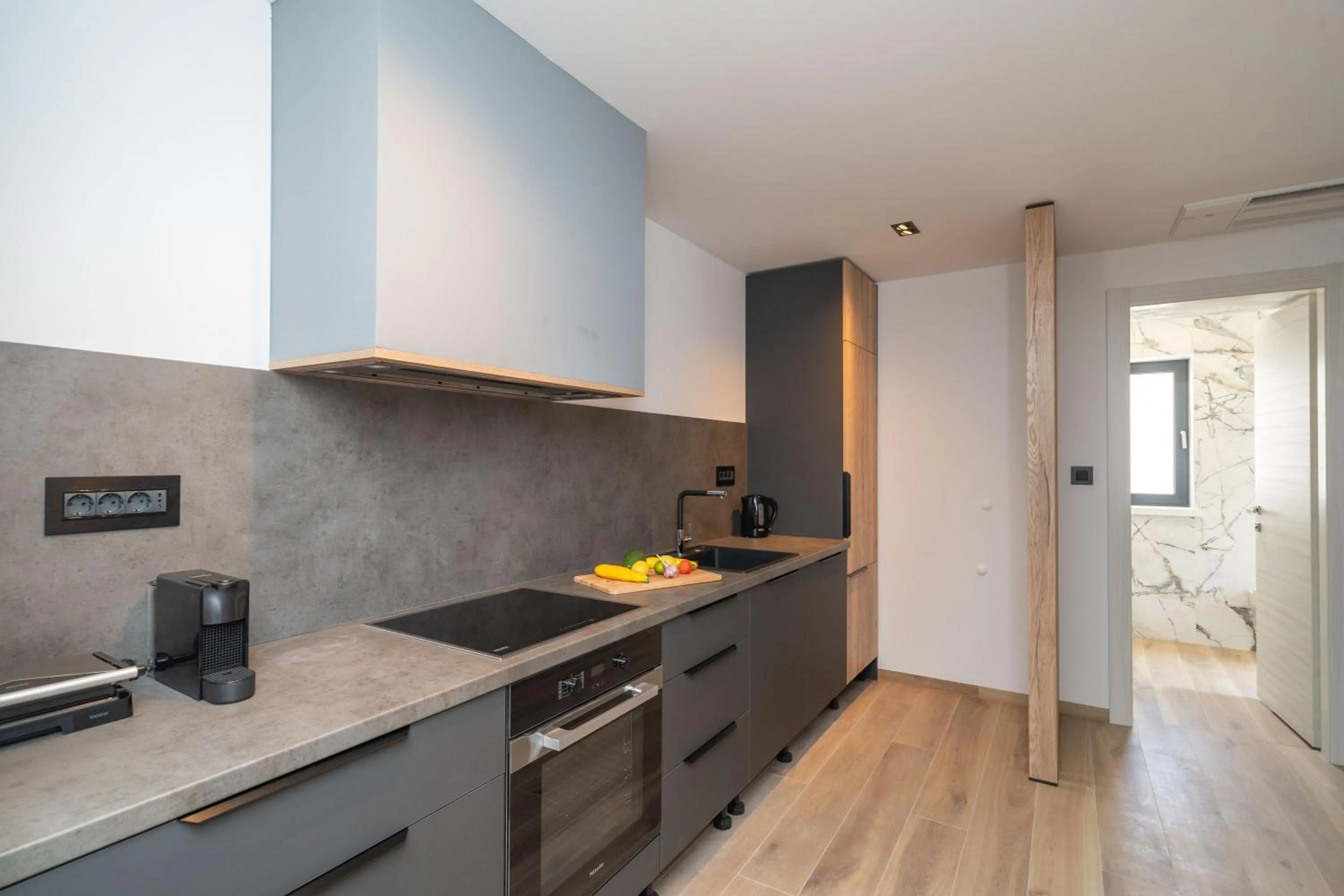 Kitchen or kitchenette in Apartments Villa Royale