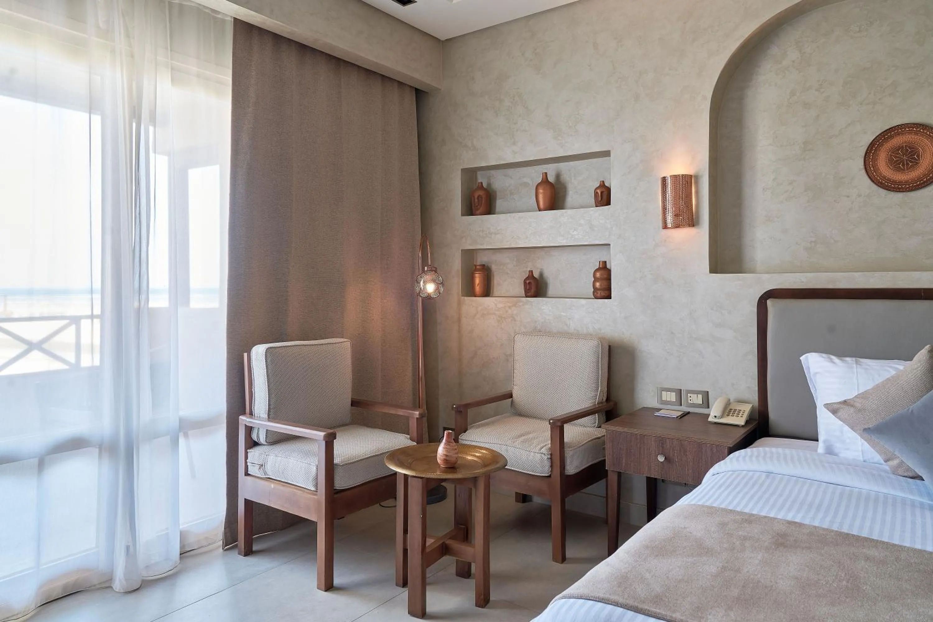 Seating area, Bed in True Beach Resort