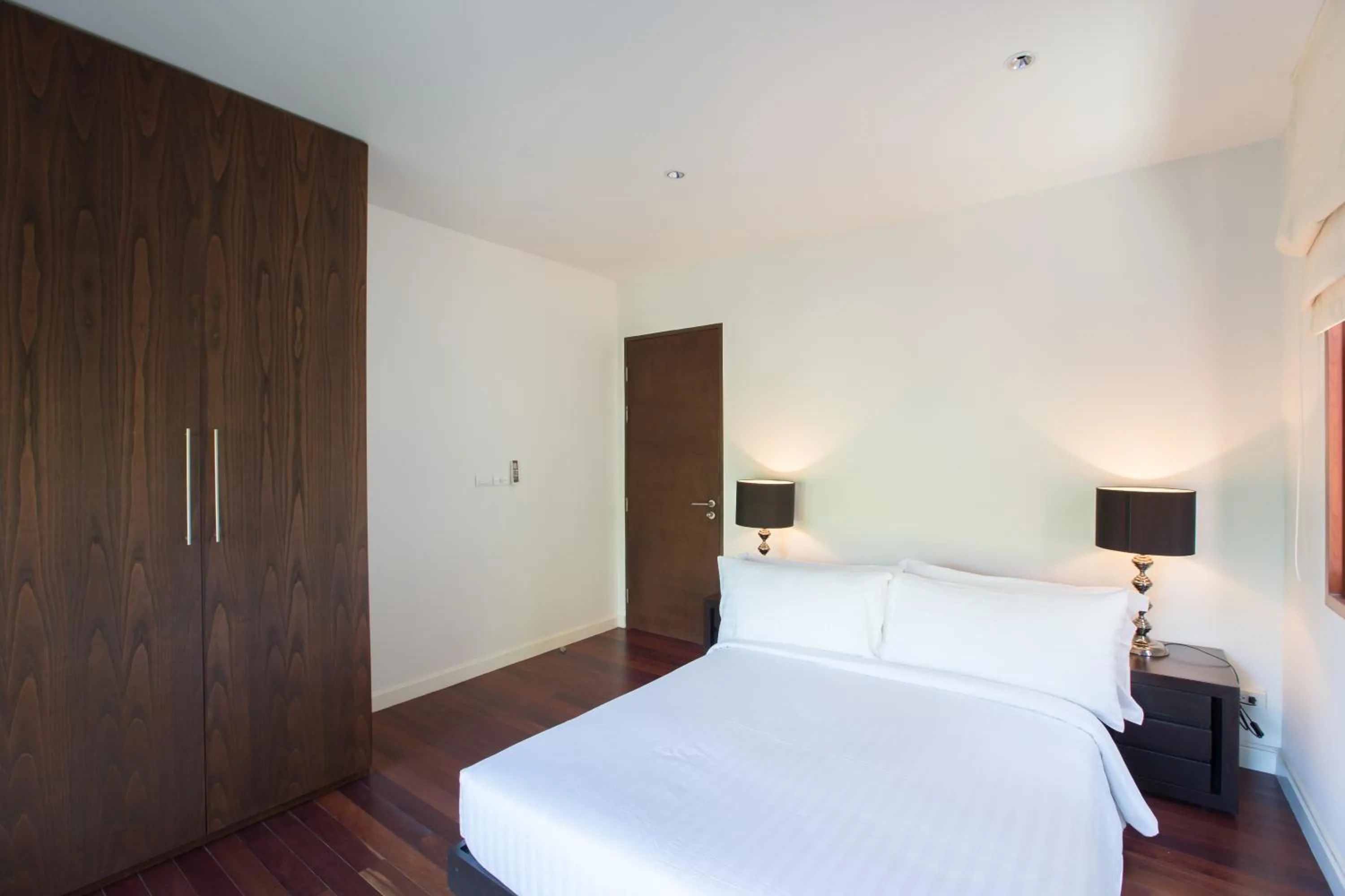 Bedroom, Bed in Amatapura Beachfront Villa 1, SHA Certified