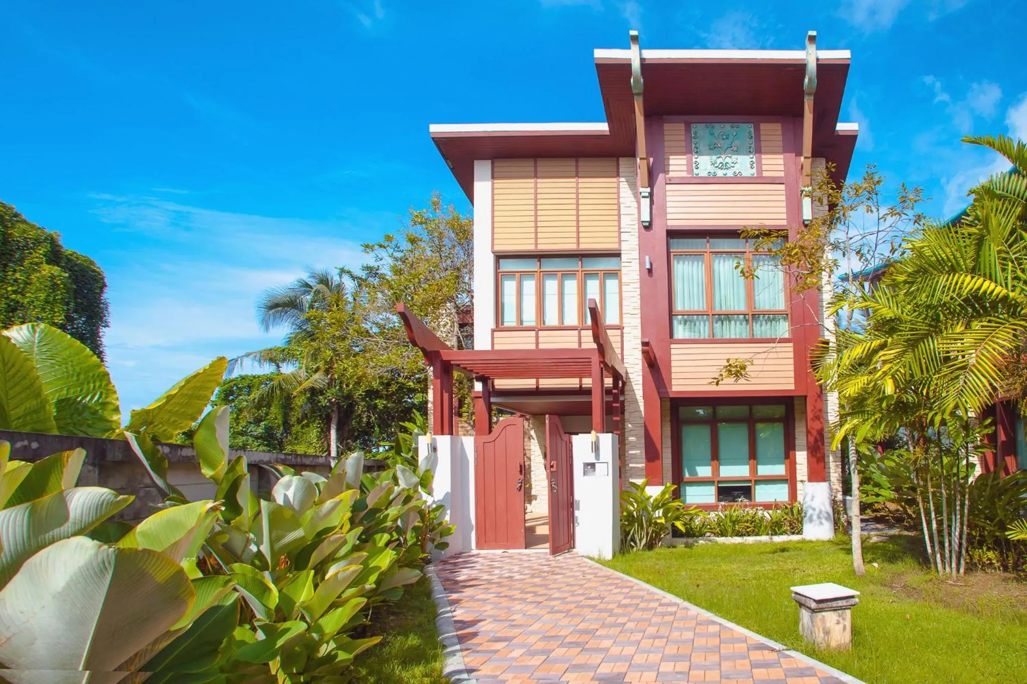 Garden in Amatapura Beachfront Villa 1, SHA Certified