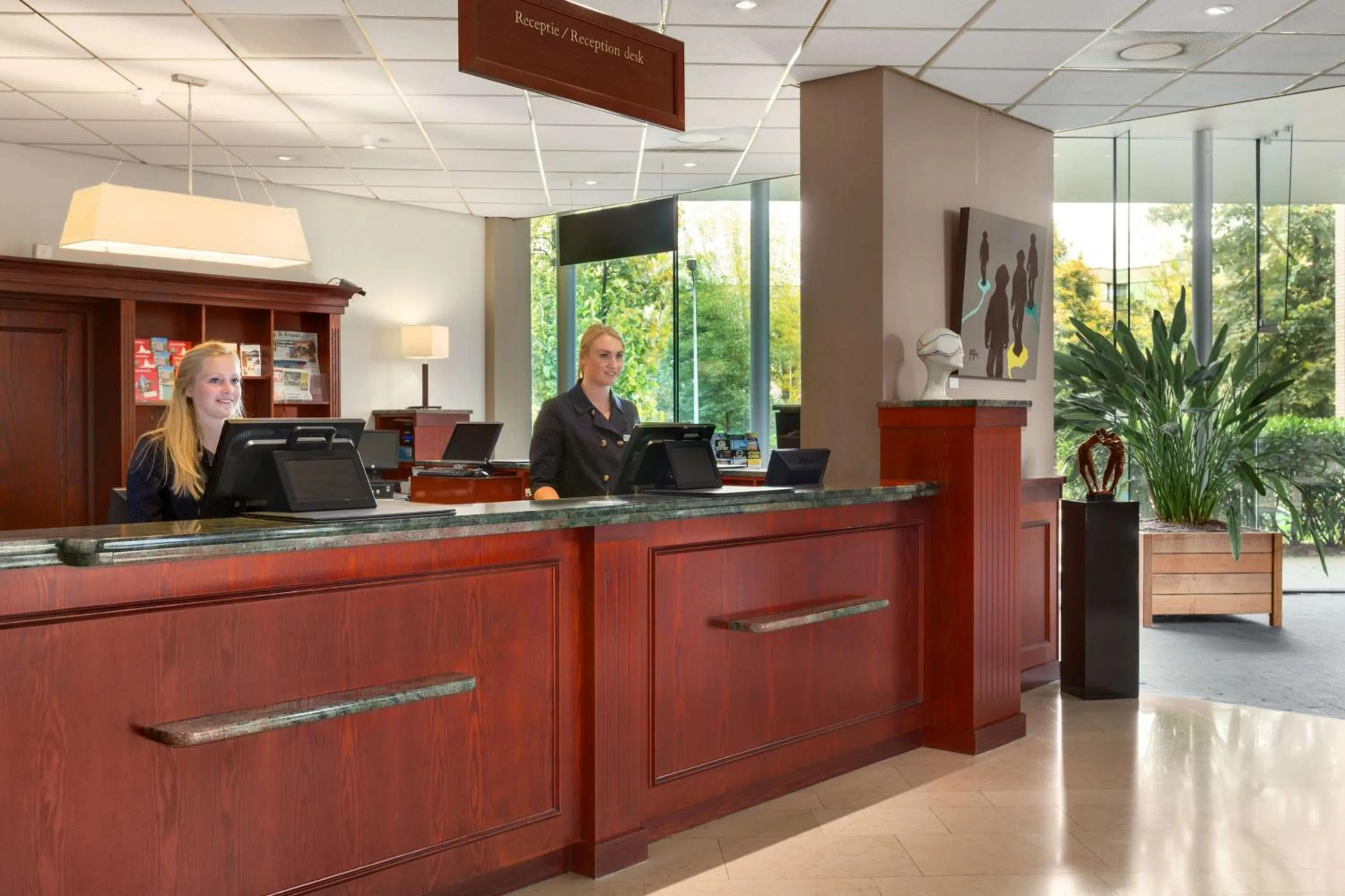 Lobby or reception in NH Maastricht