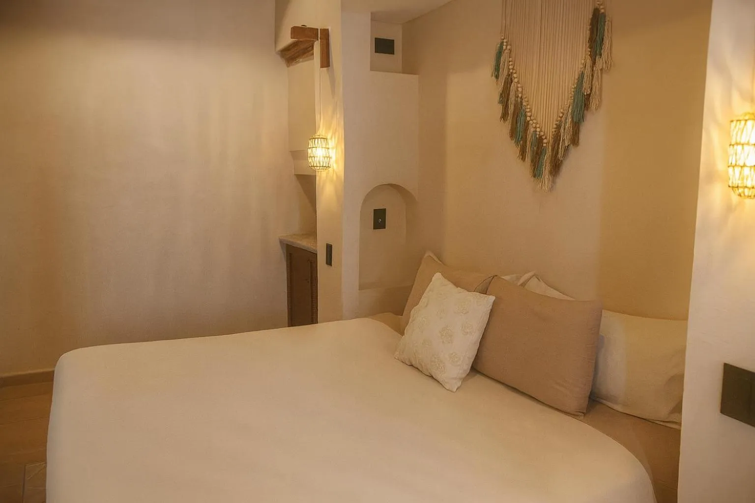 Bed in Enigmatic Hotel Experience