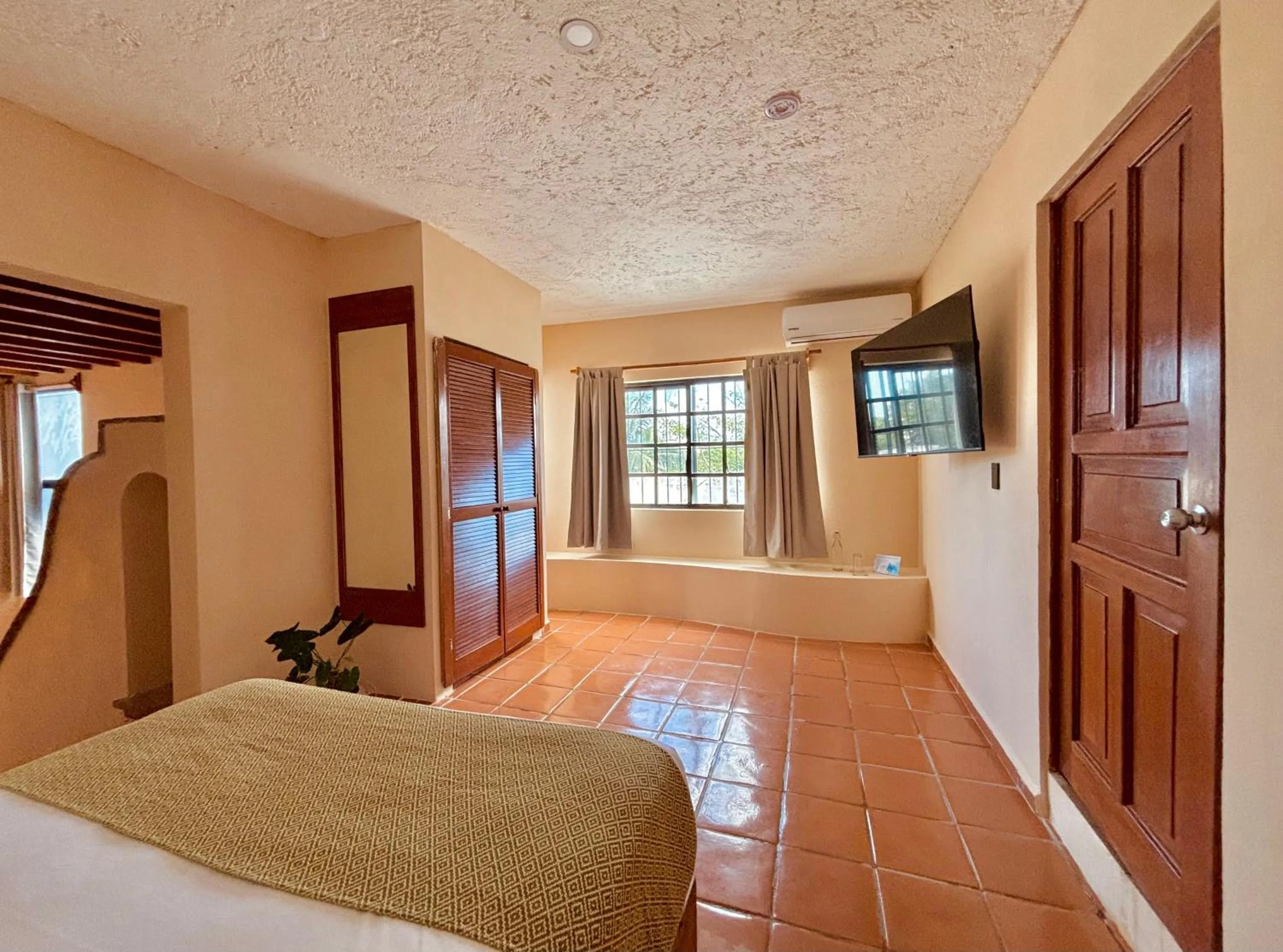 Bed in Enigmatic Hotel Experience