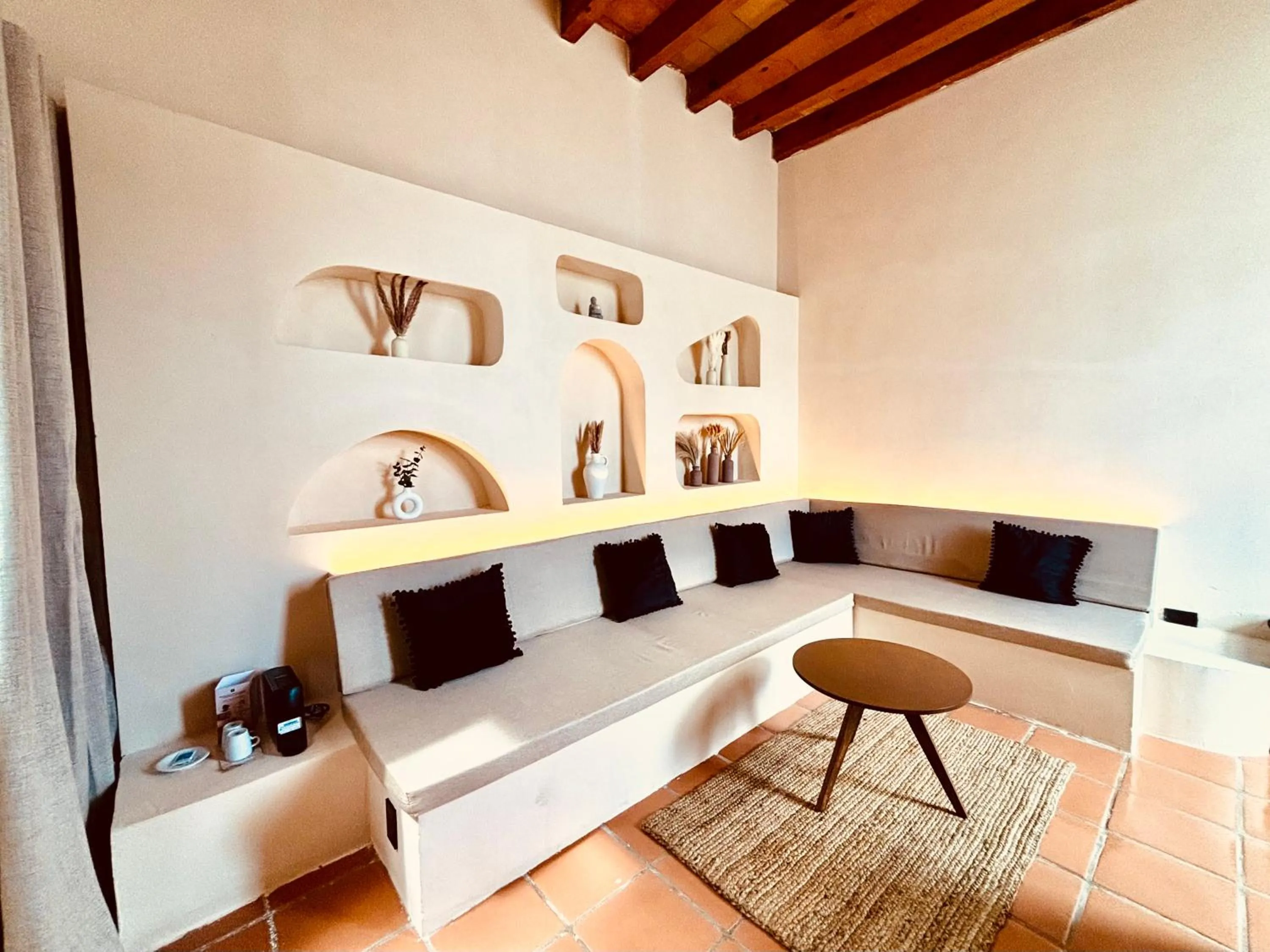 Living room, Bed in Enigmatic Hotel Experience