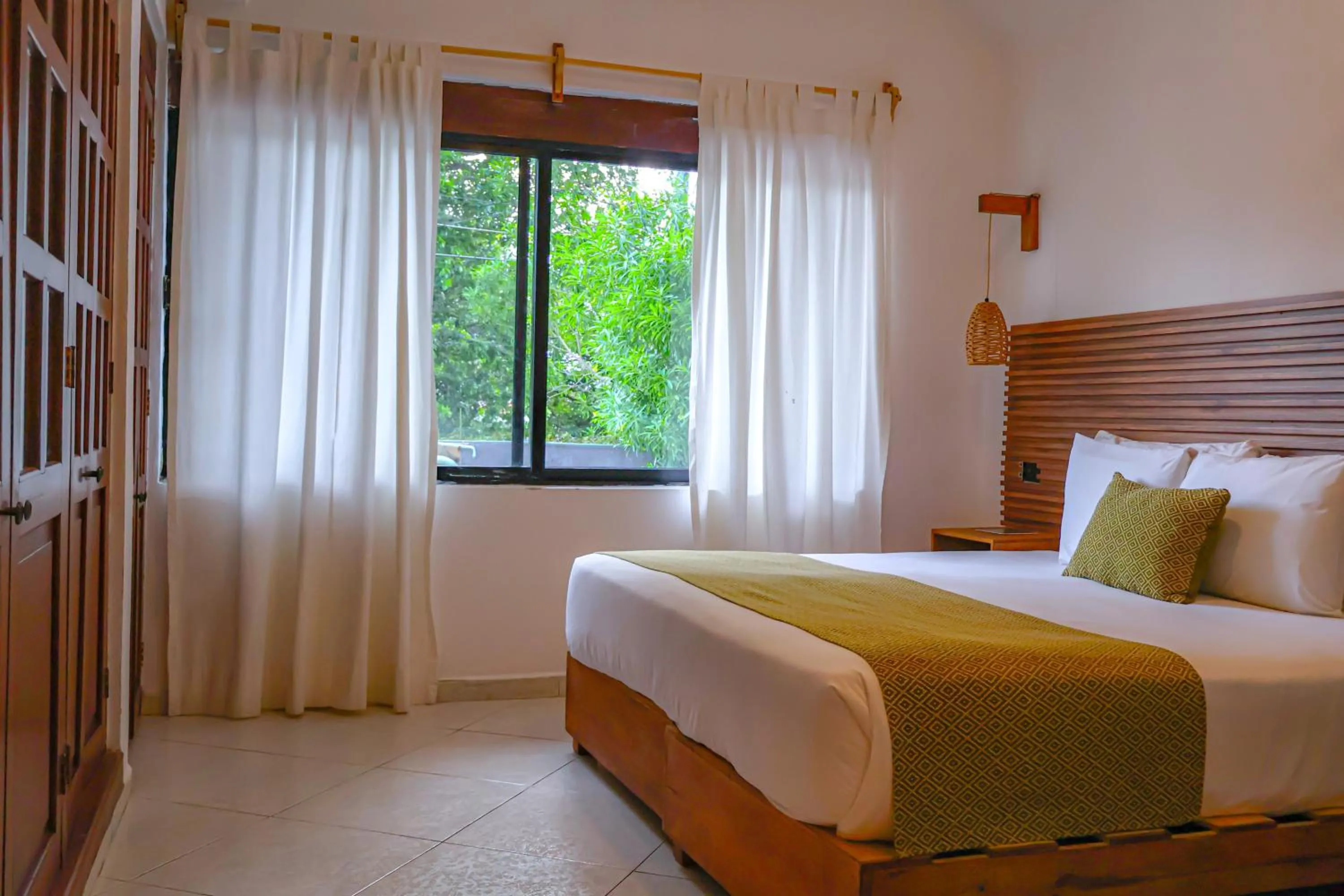 Bed in Enigmatic Hotel Experience