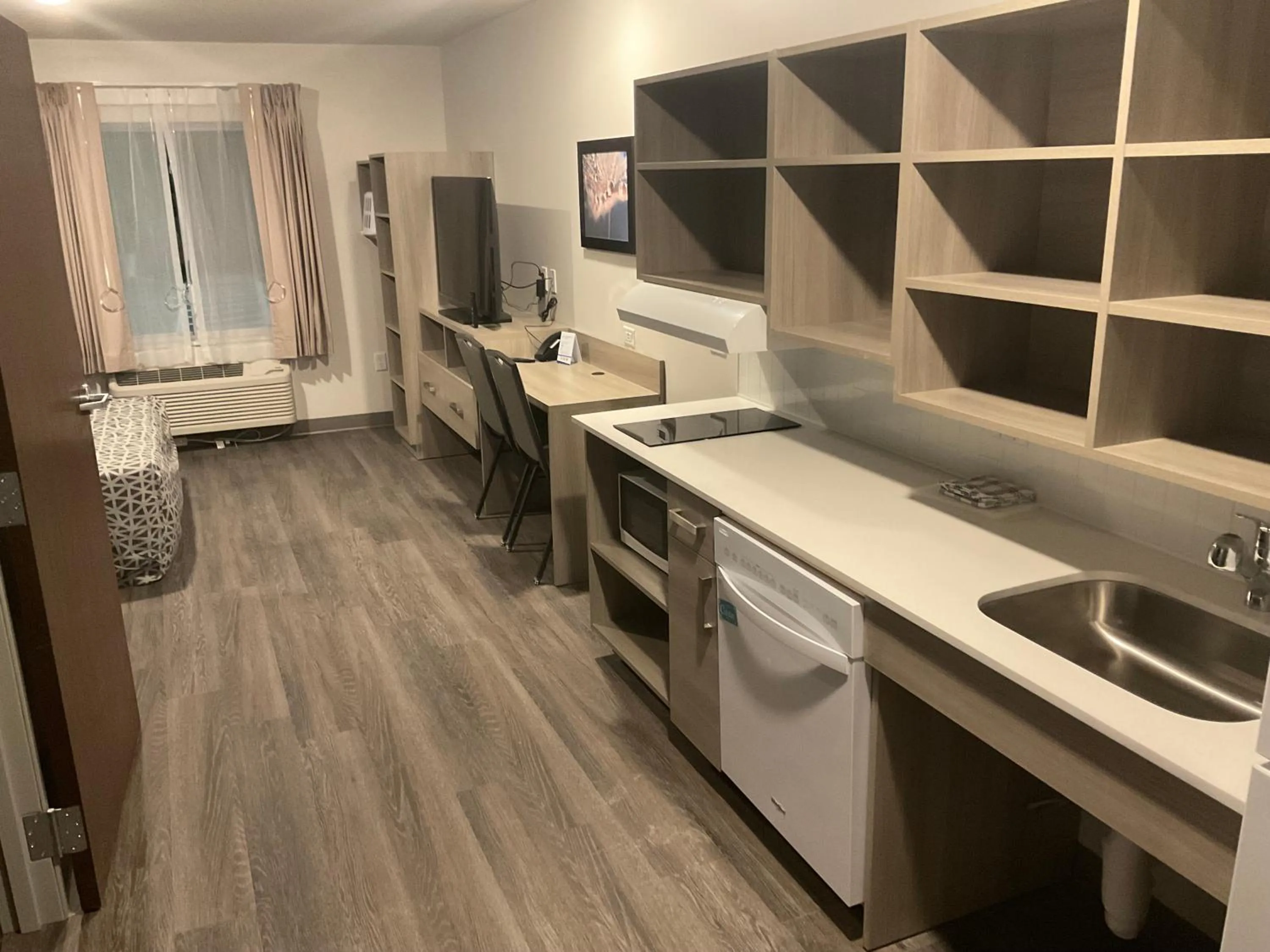 Kitchen or kitchenette in WoodSpring Suites East Lansing - University Area