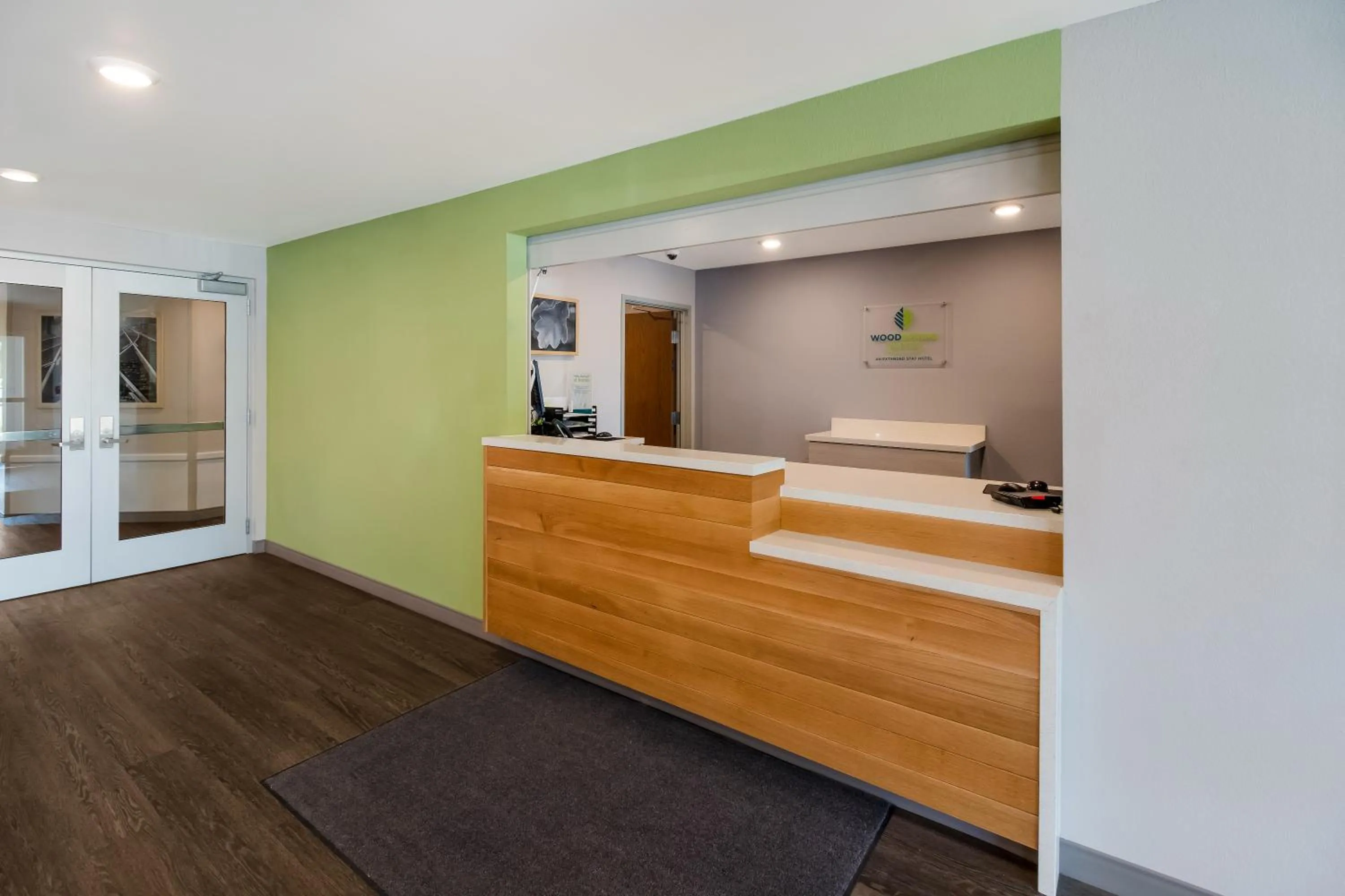 Lobby or reception in WoodSpring Suites East Lansing - University Area