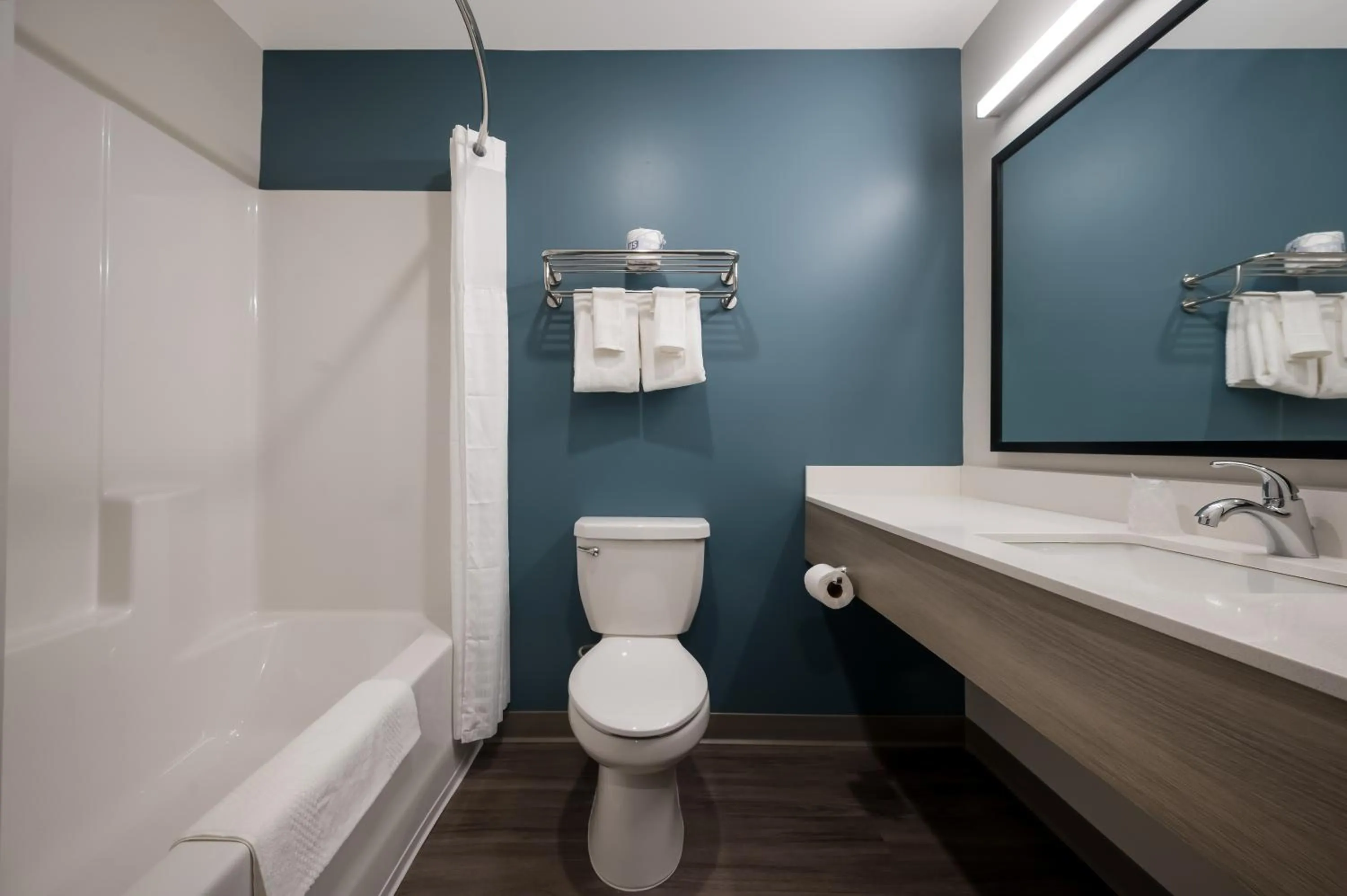 Bathroom in WoodSpring Suites East Lansing - University Area