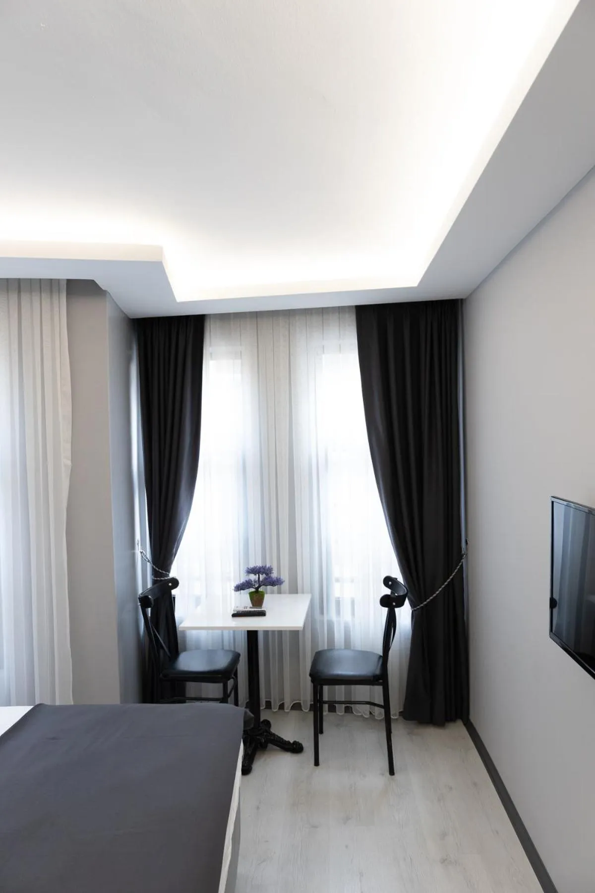 TV and multimedia, Bed in Aya Langa Guest House