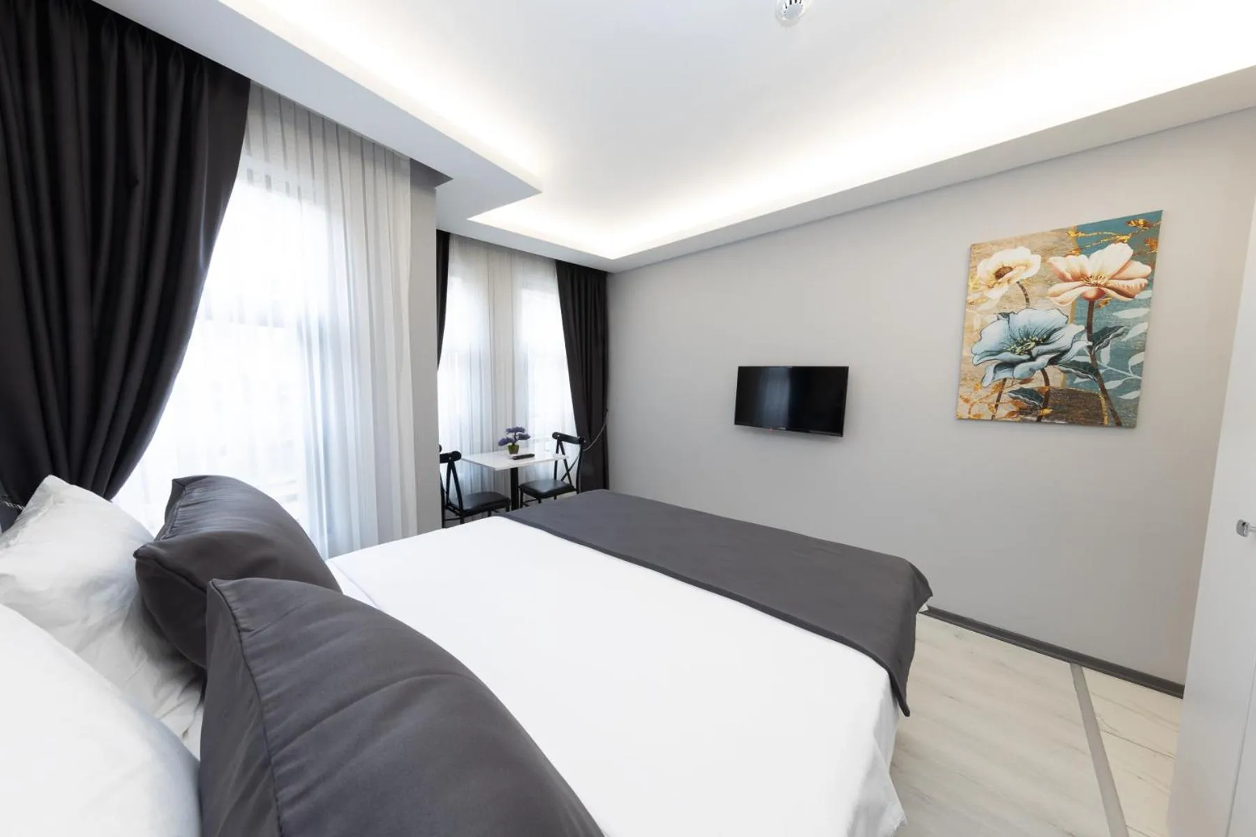 TV and multimedia, Bed in Aya Langa Guest House