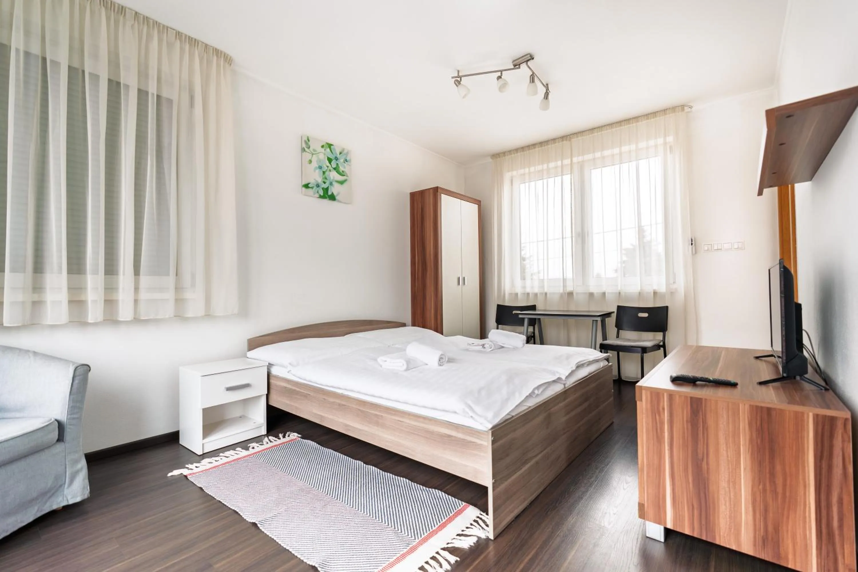 Photo of the whole room, Bed in Fine Restaurant & Apartments