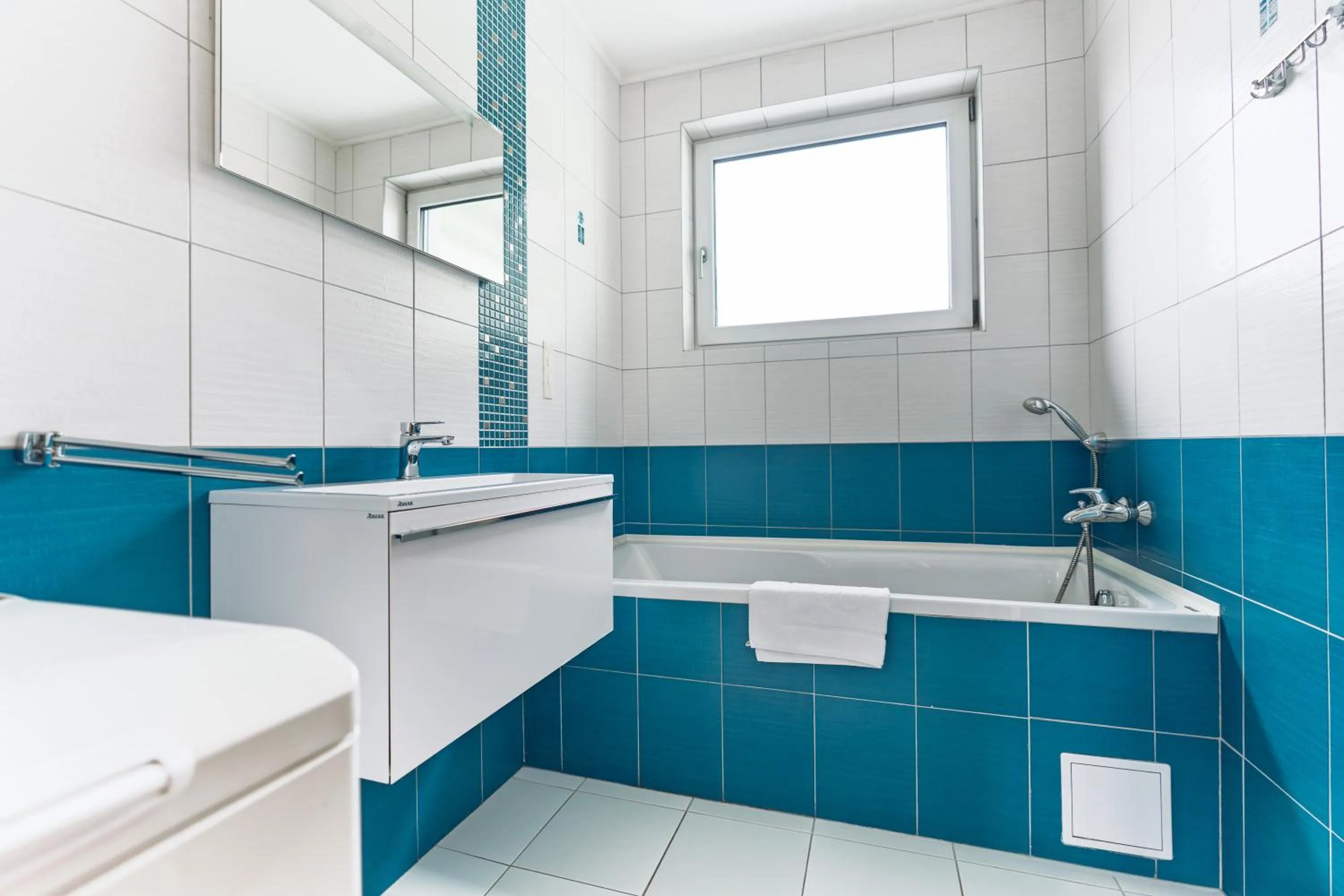 Bathroom in Fine Restaurant & Apartments