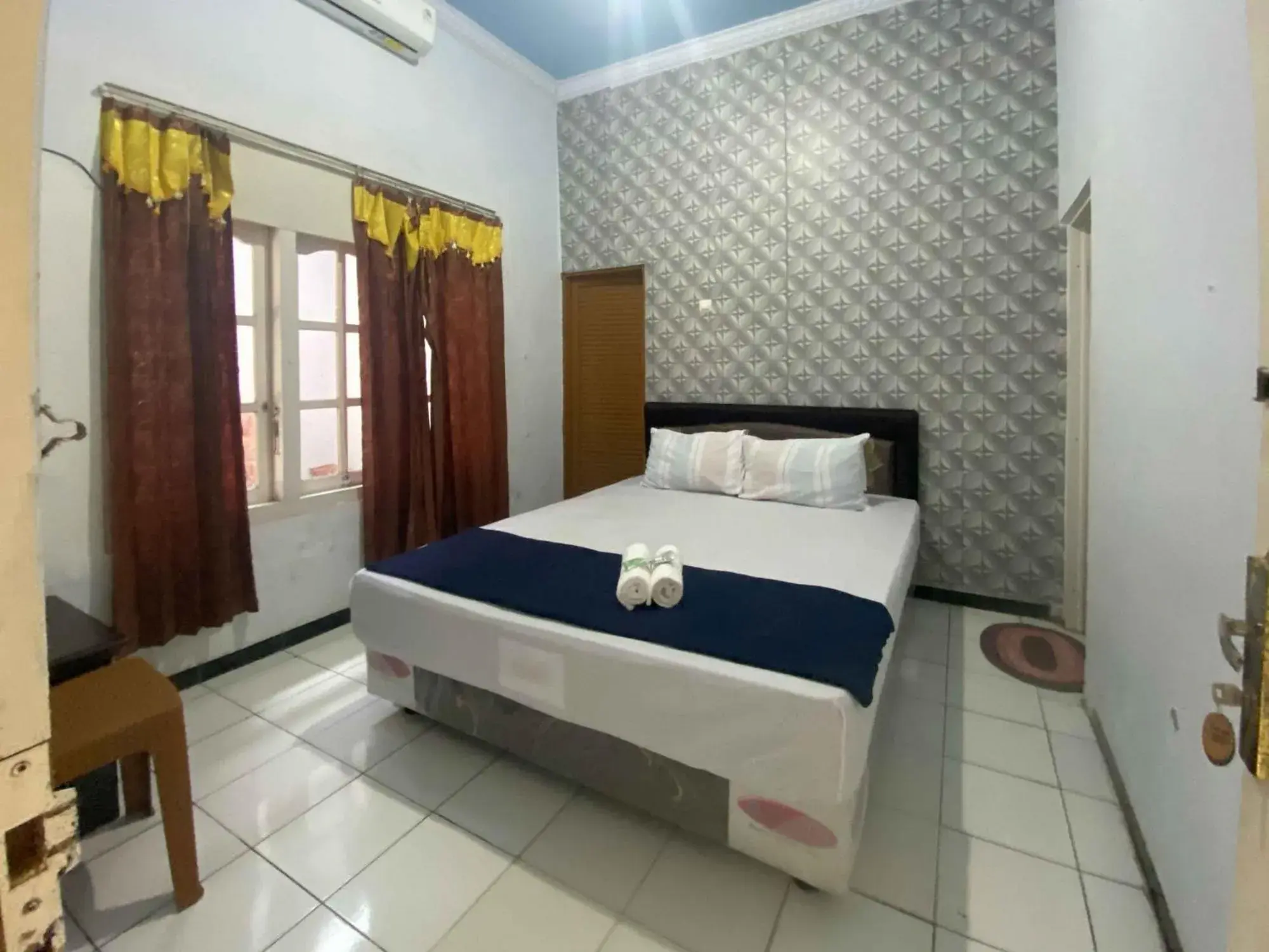 Bed in Guest House Hj Muriyah Syariah Slawi Mitra RedDoorz Bed in Guest House Hj Muriyah Syariah Slawi Mitra RedDoorz