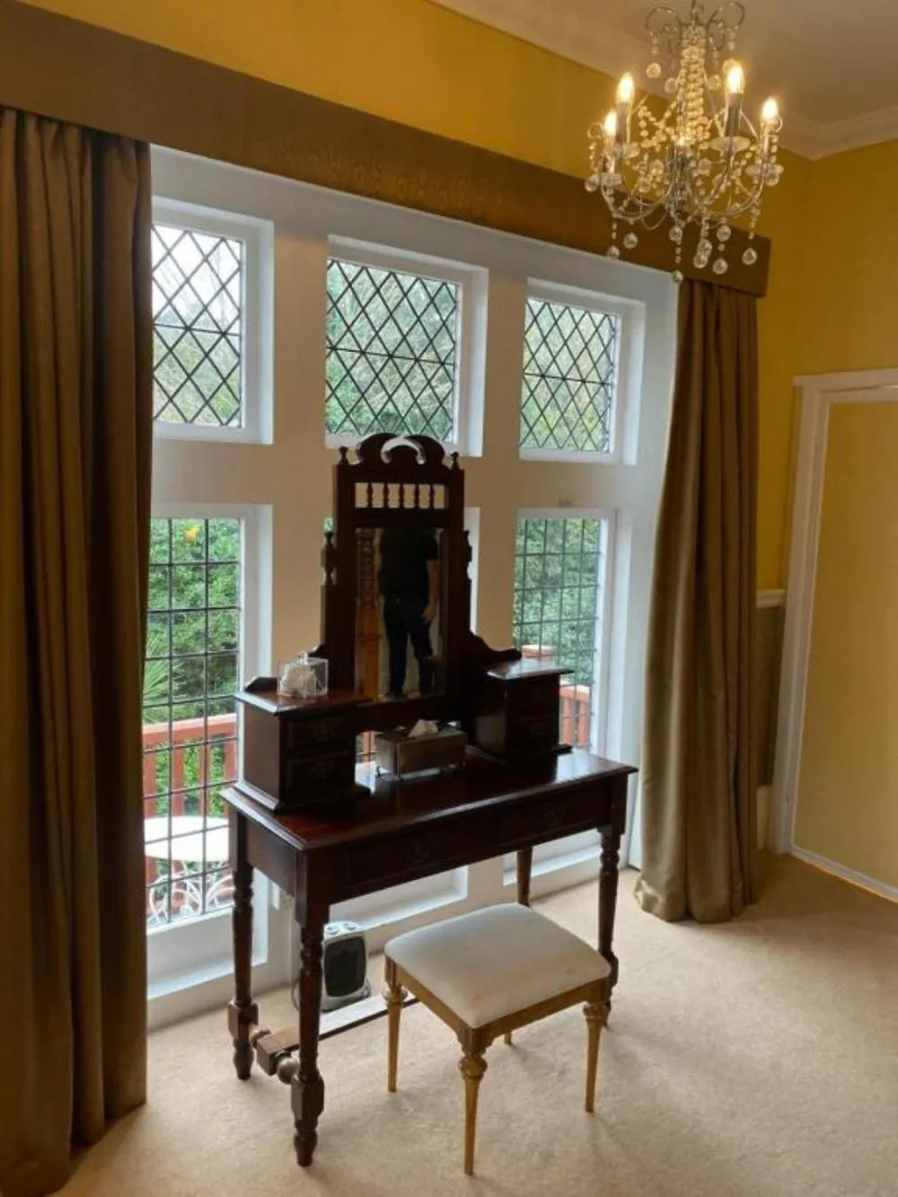 Bedroom in Langtry Manor Hotel