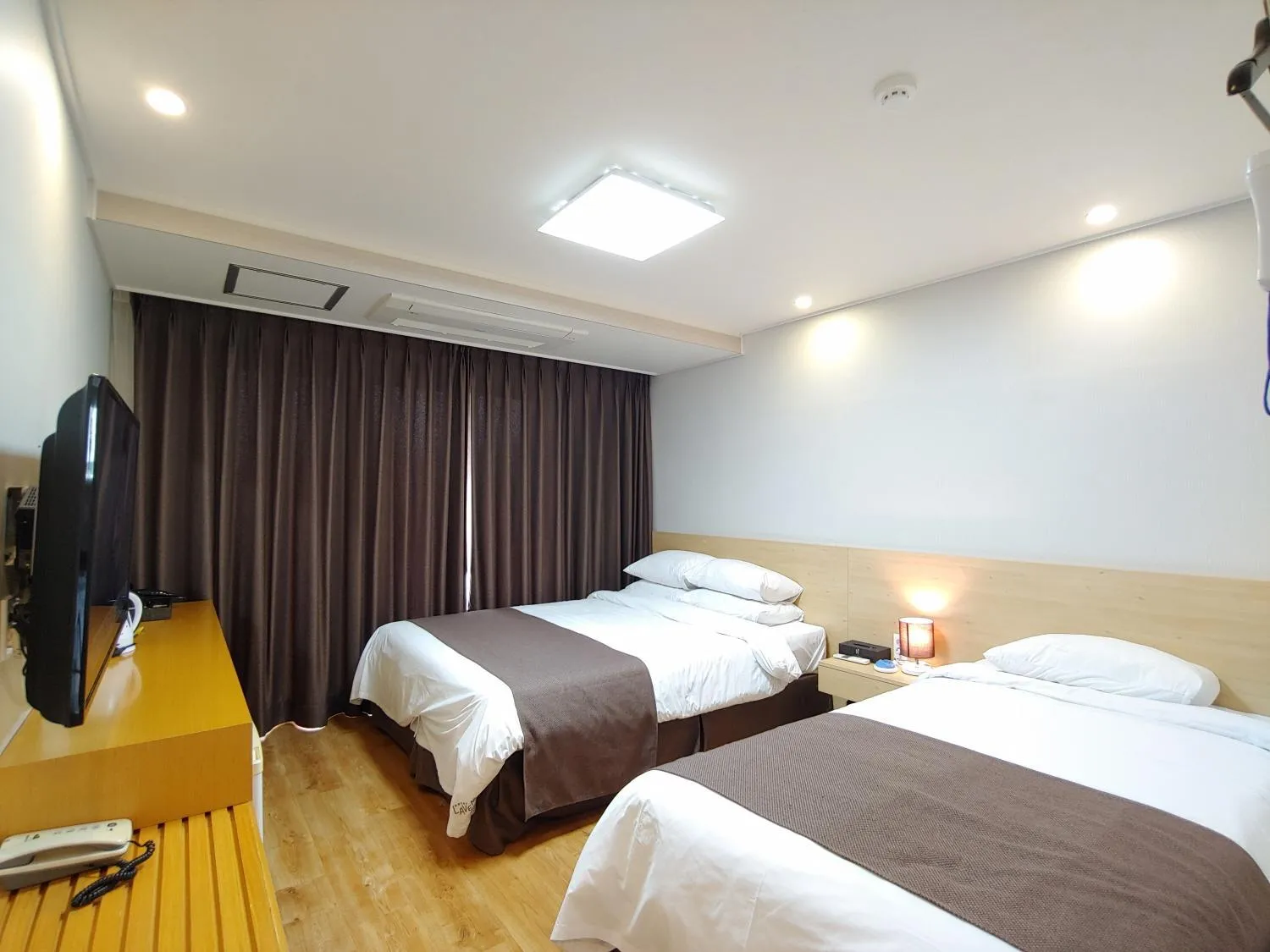 Bed in Jeju Lavender Hotel