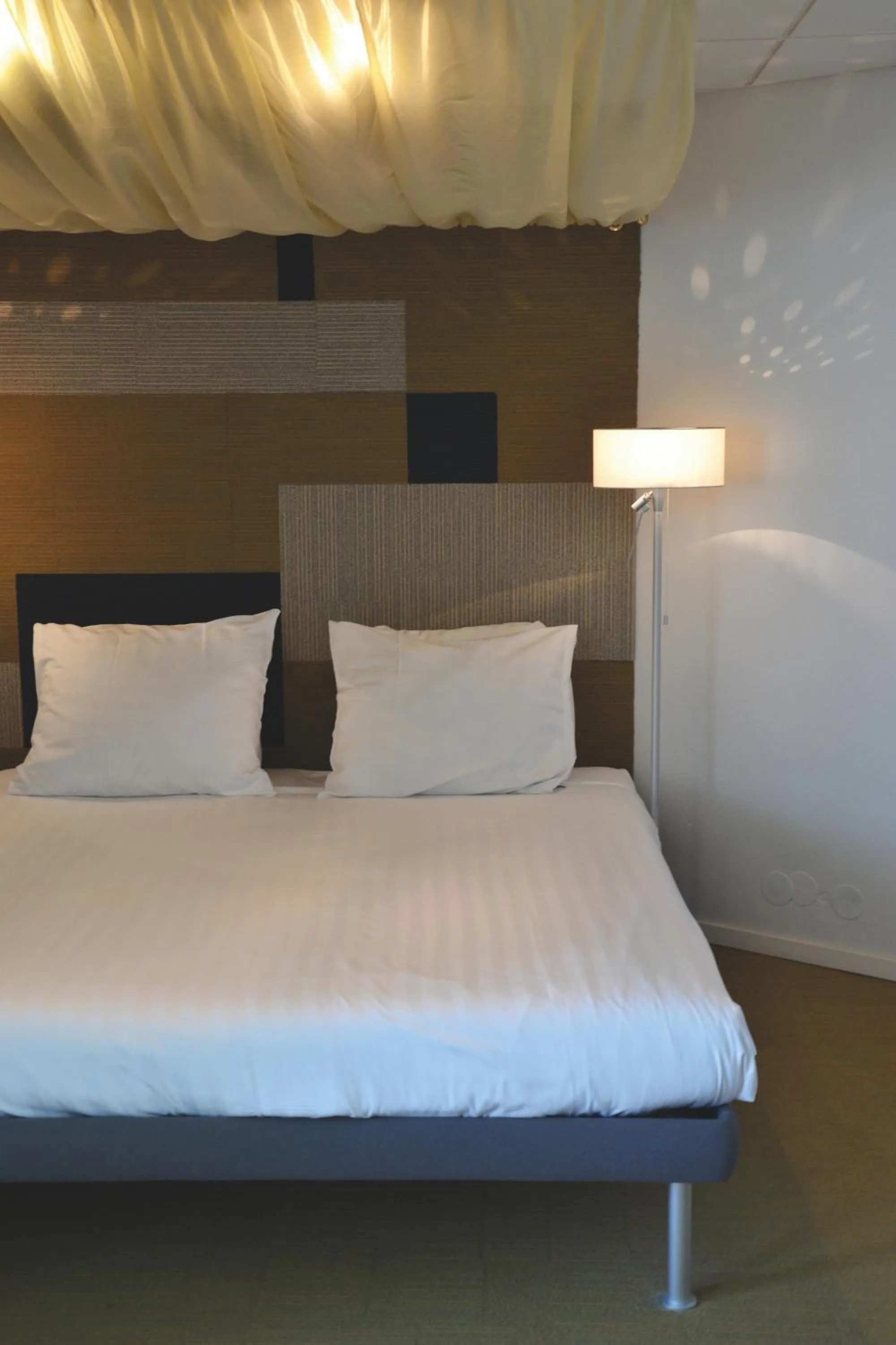 Bed in Fletcher Hotel Restaurant Carlton