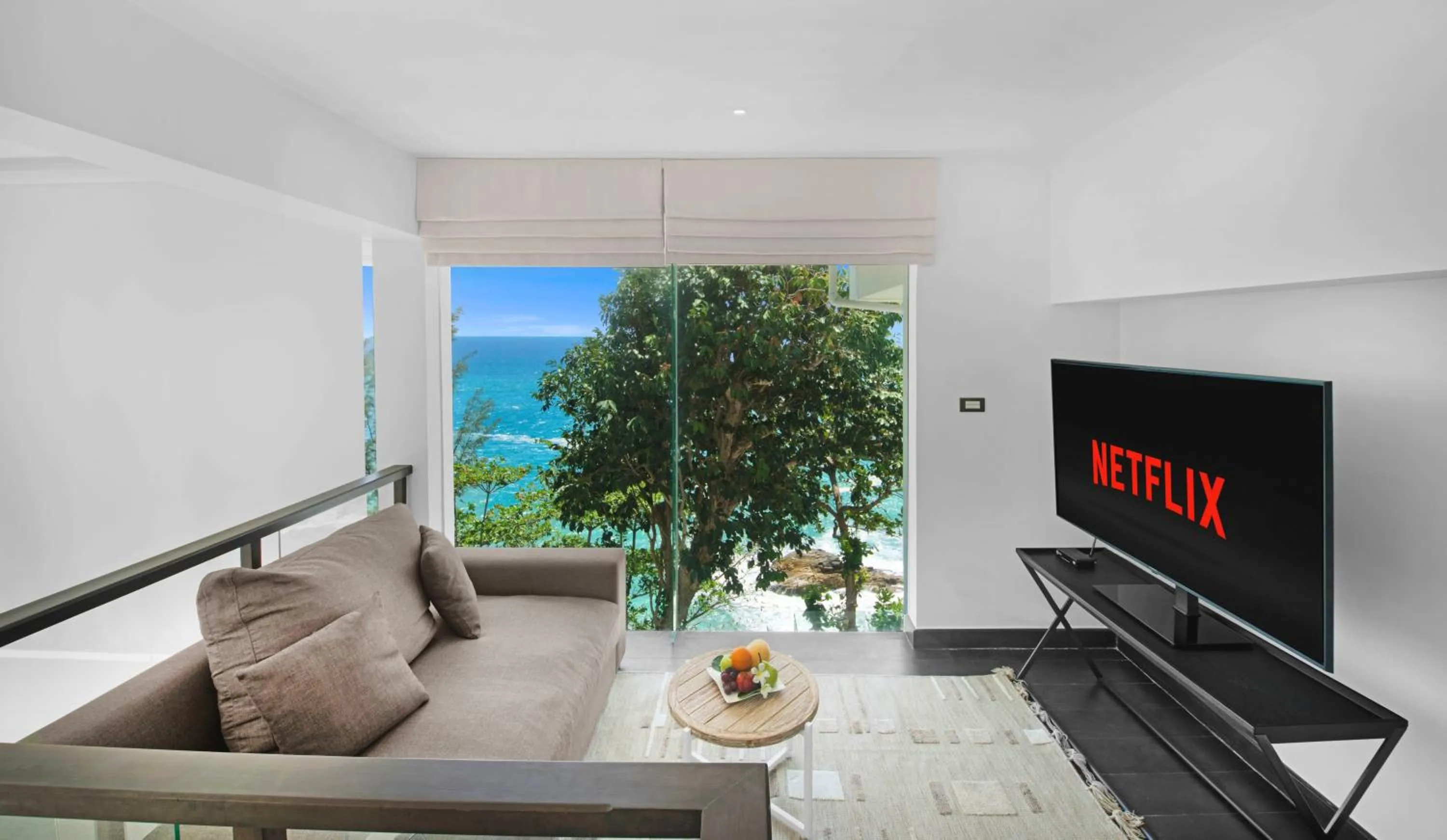 Communal lounge/ TV room in Villa La Prana