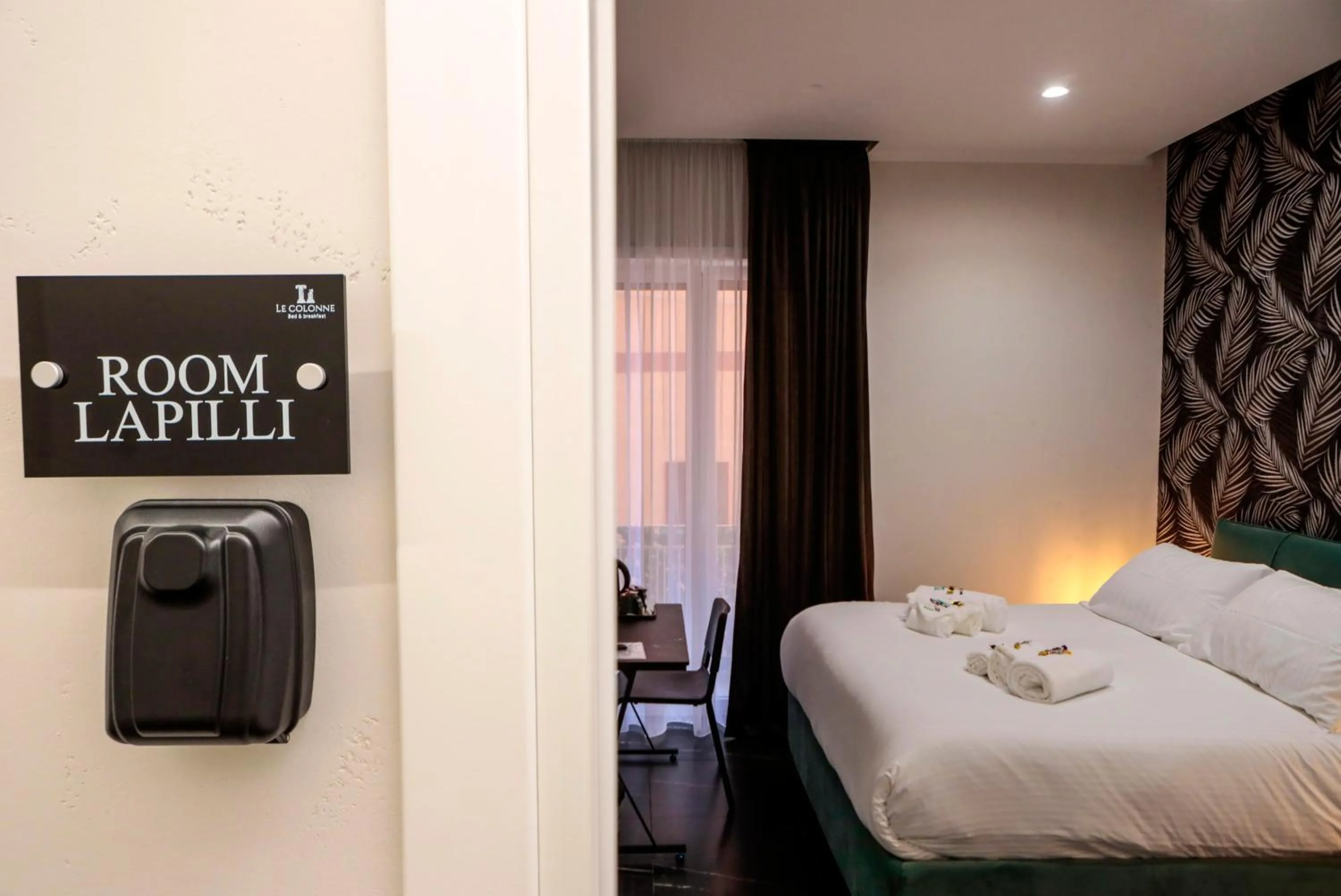 Bed in Le Colonne B&b