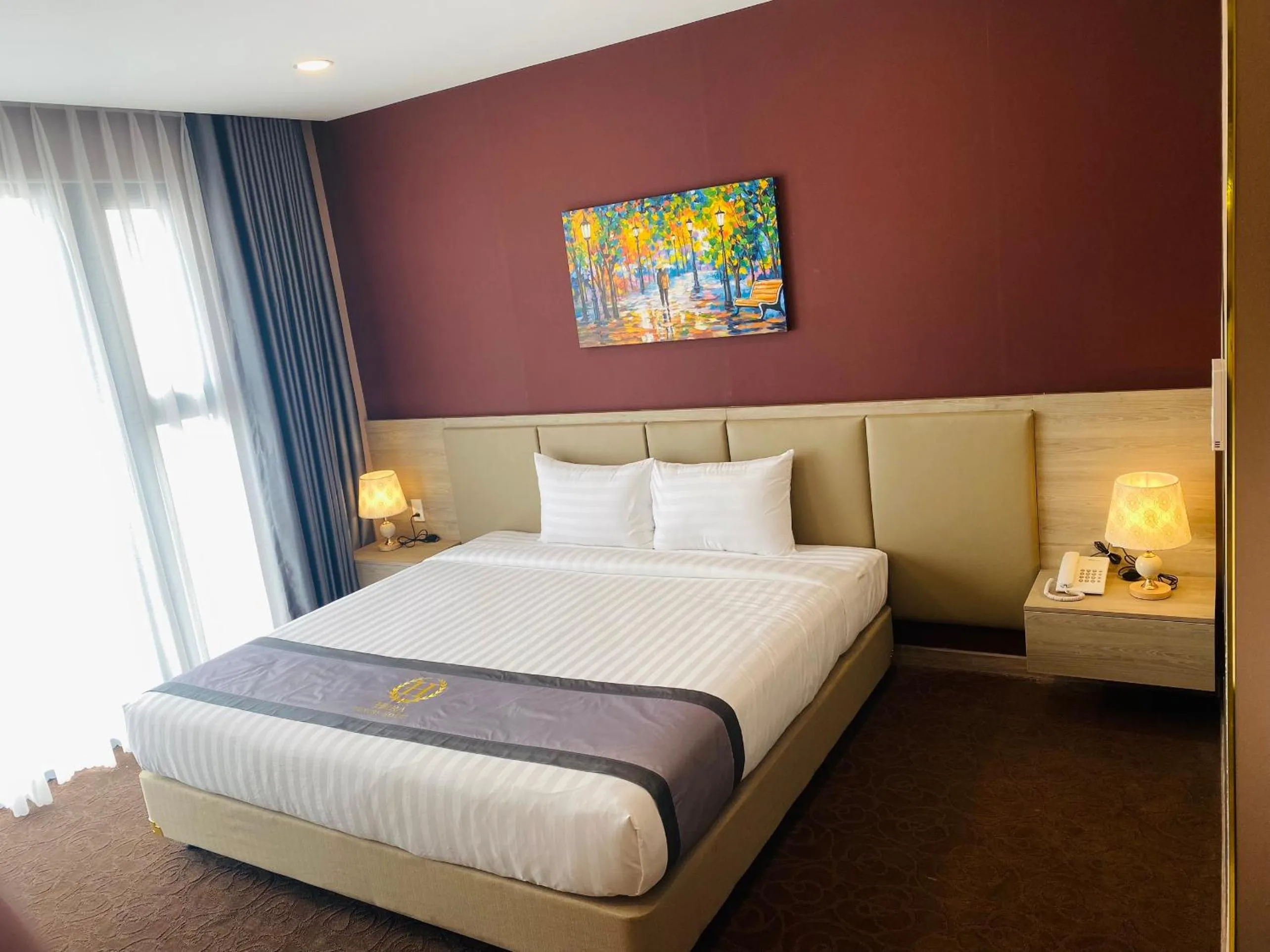 Bed in Hera Luxury Hotel