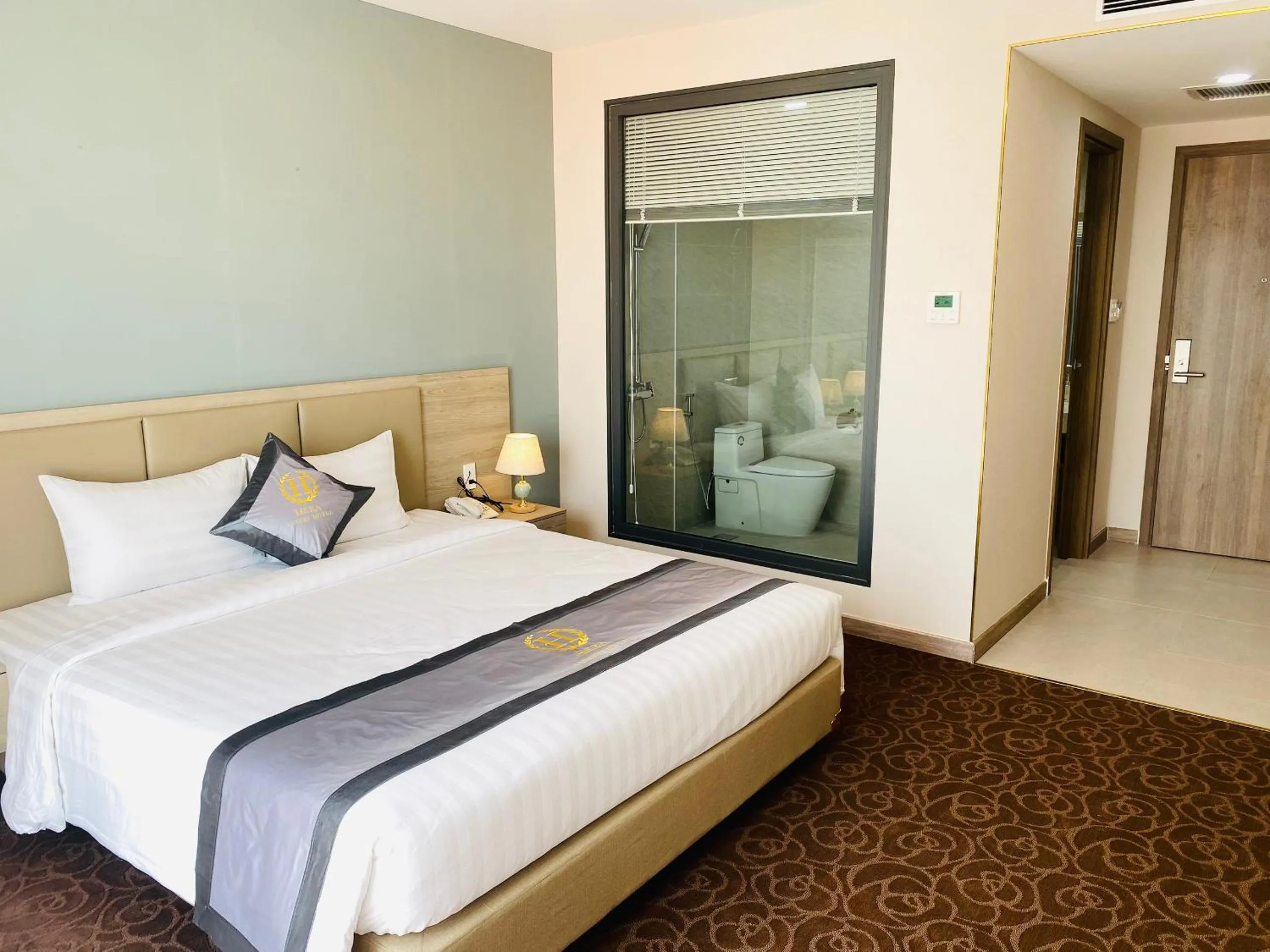 Bed in Hera Luxury Hotel