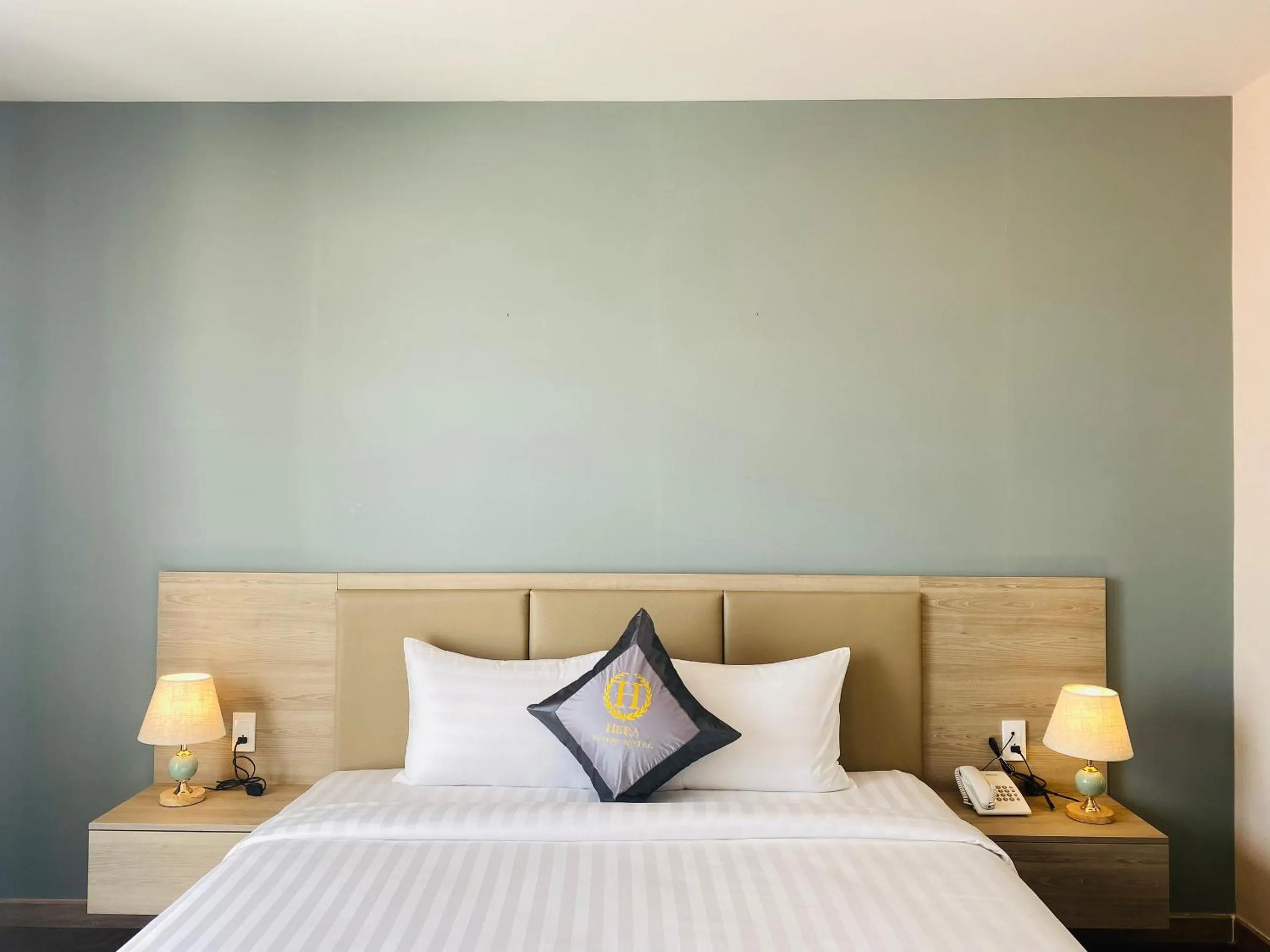 Bed in Hera Luxury Hotel