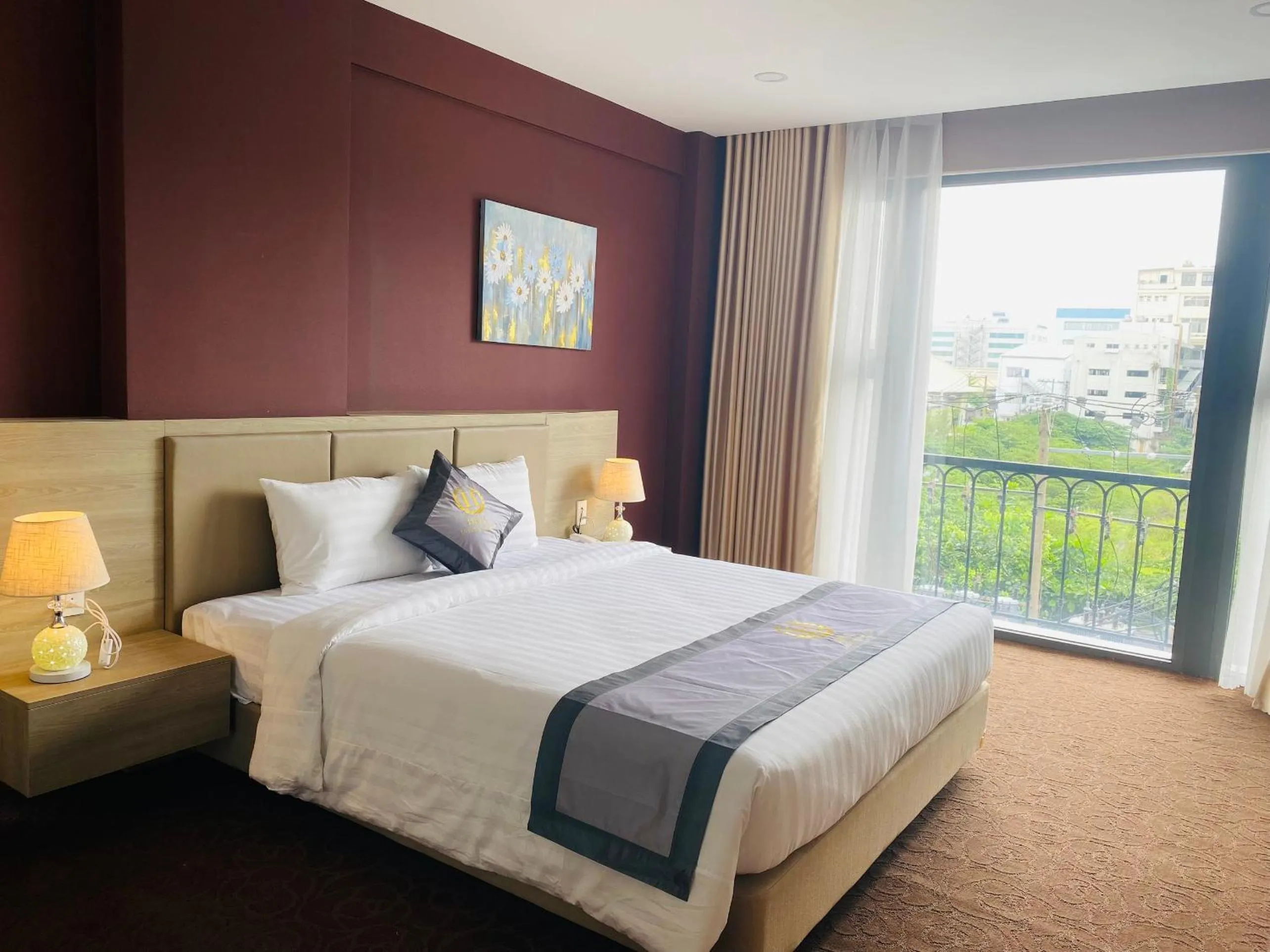 Bed in Hera Luxury Hotel