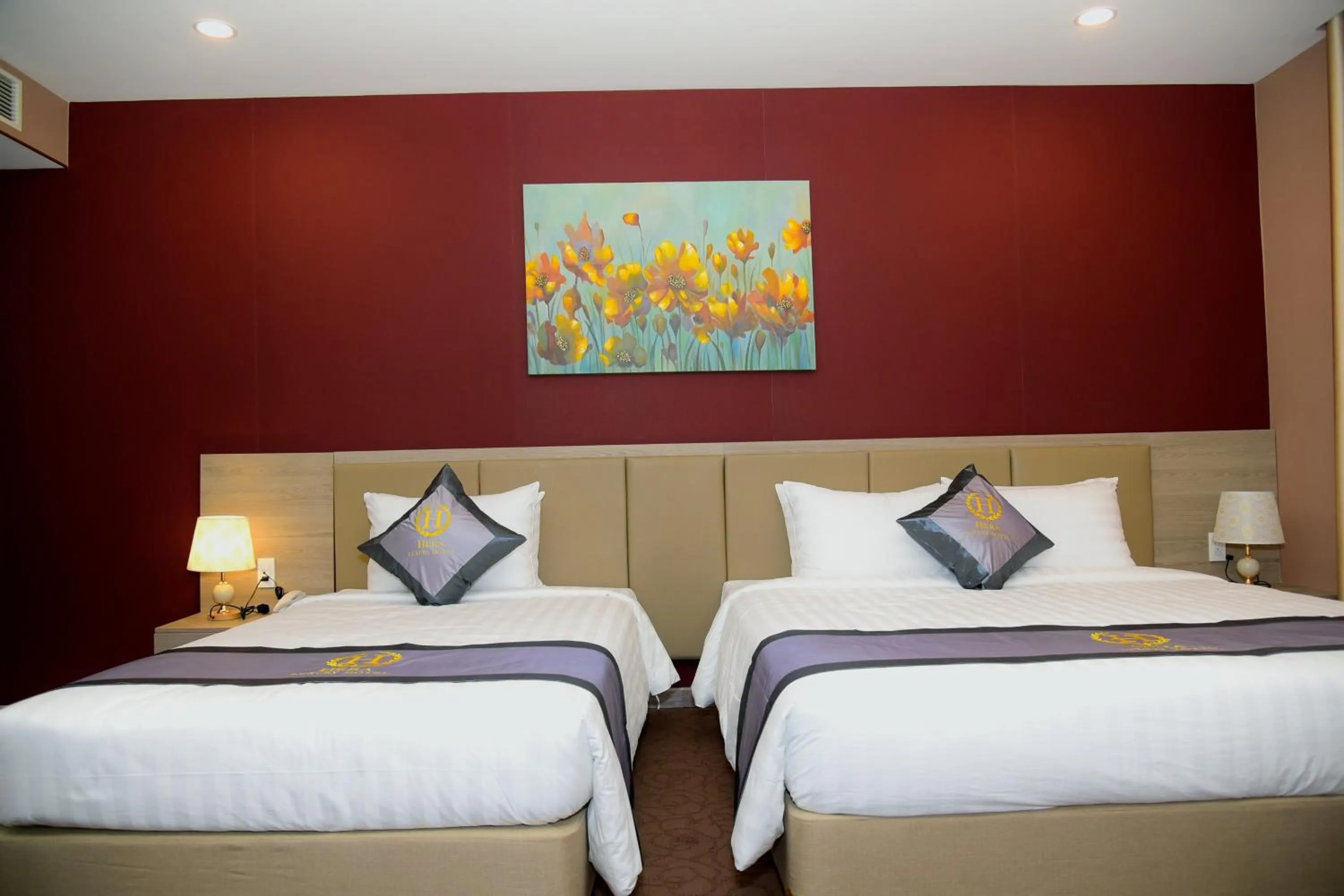 Bed in Hera Luxury Hotel