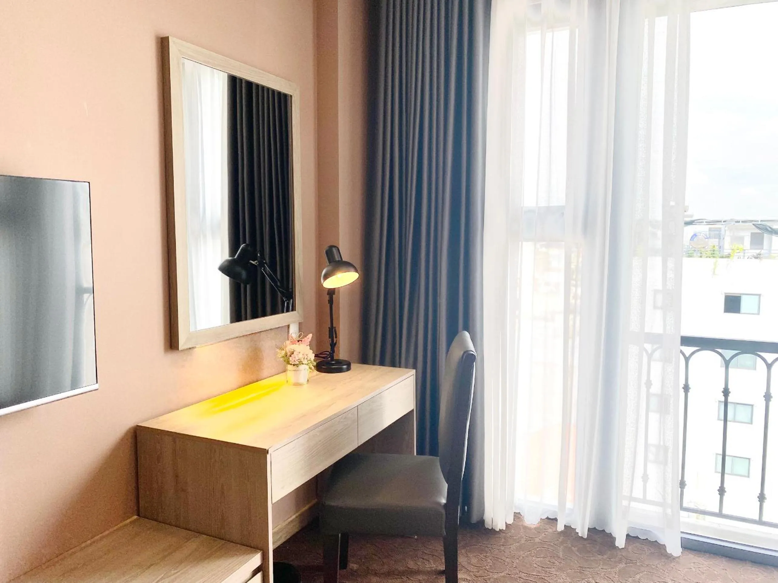 Communal lounge/ TV room in Hera Luxury Hotel