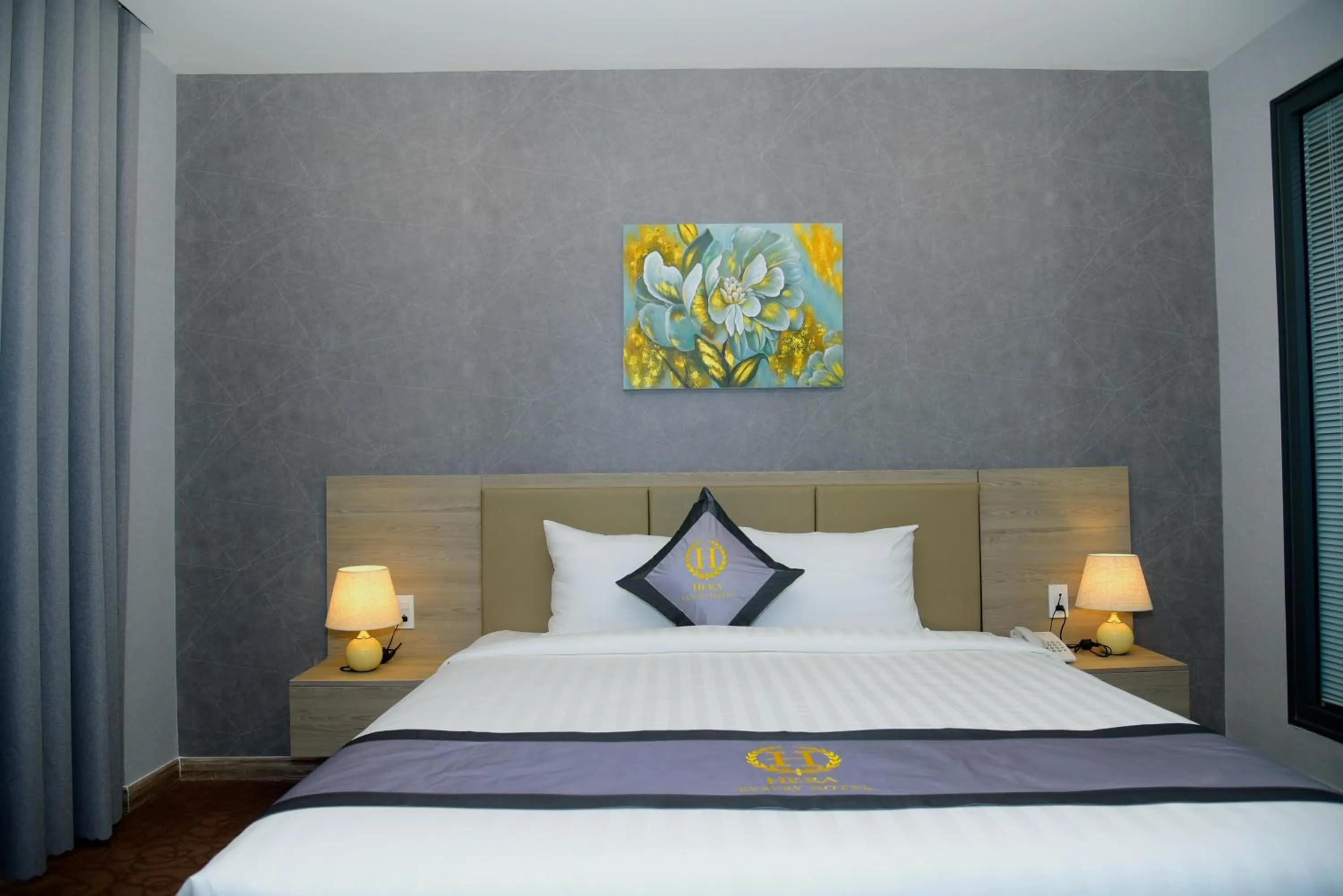 Bed in Hera Luxury Hotel