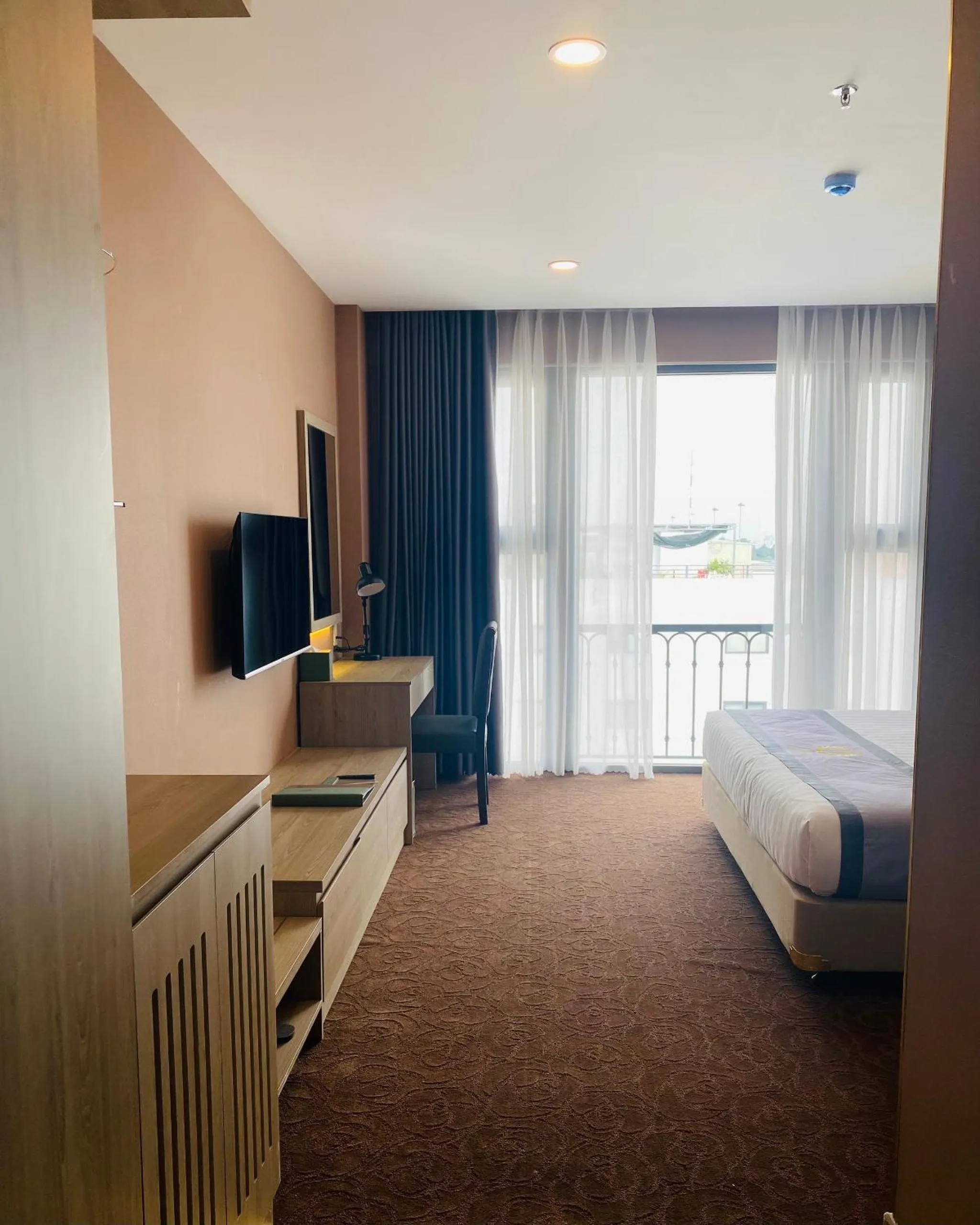 Bed in Hera Luxury Hotel